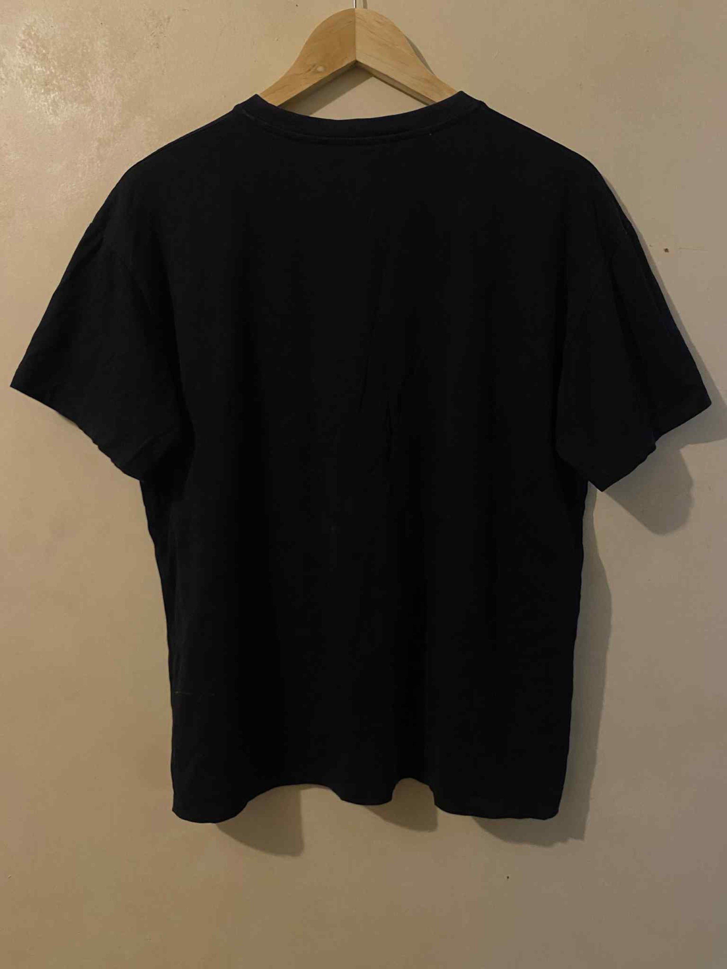 Gucci Boutique Black Shirt (Category: Luxury Apparel) located in Cagayan de Oro. Submitted by timeless.ph (Listing ID 1421041205, Image 3). Description: Size: M Width: 21 Length: 25 Color rate: 9.8/10 Condition: Excellent Issue: Plus shipping fee *color may vary due to lighting*.
