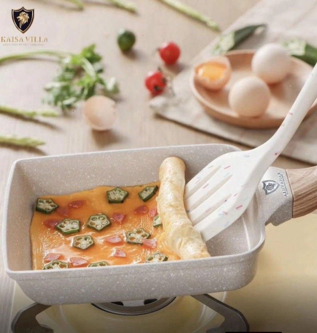 Kaisa Villa Egg Pan (Category: Cookware & Accessories) located in Manila. Submitted by jelai.cybyb (Listing ID 1421113565, Image 3). Description: Kaisa Villa egg pan is perfect for making omelets and other small dishes. It features a non-stick surface and a wooden handle for easy cooking and handling. The pan is 15x19cm, ideal for individual servings. It's part of a cookware set and is designed for efficient and even cooking..