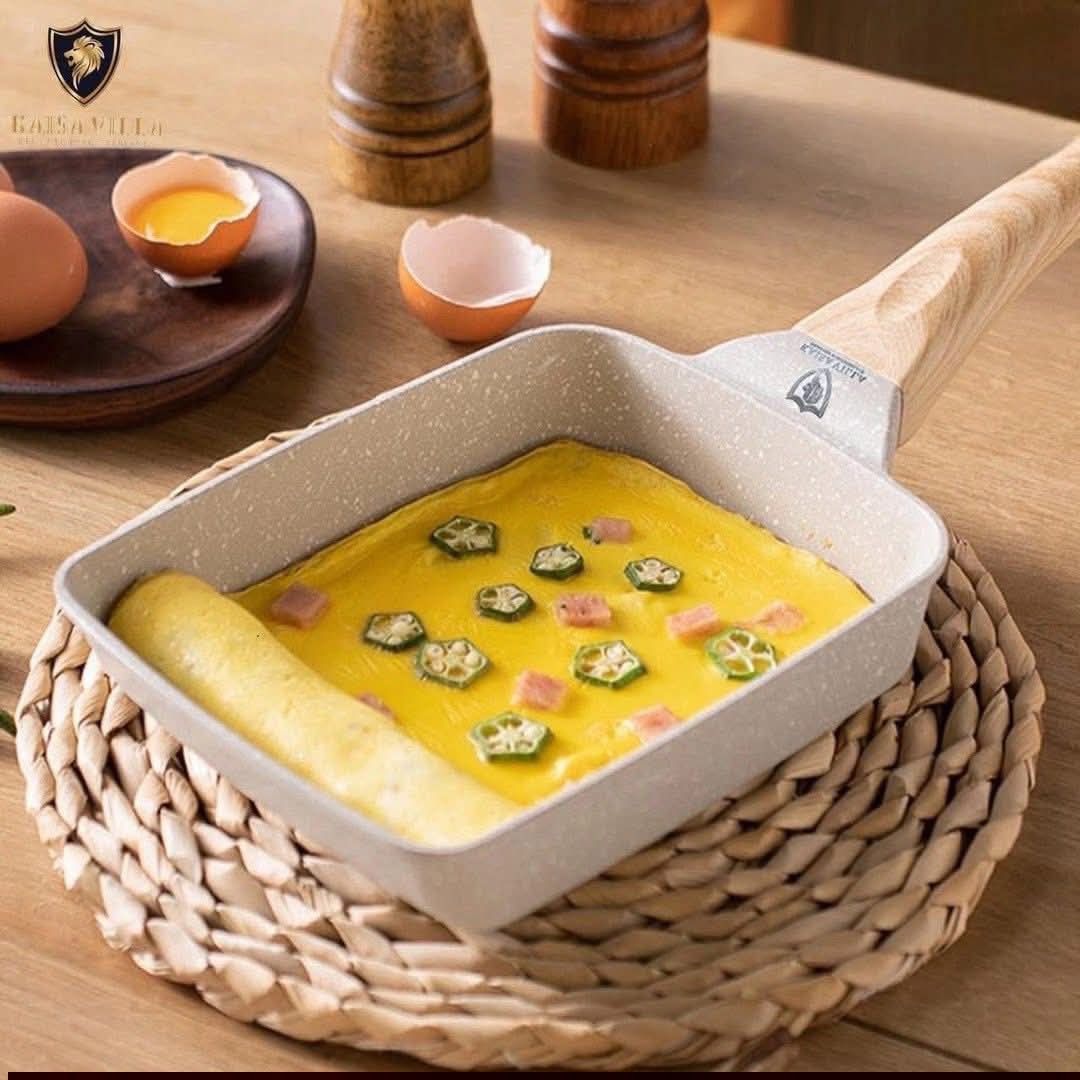 Kaisa Villa Egg Pan (Category: Cookware & Accessories) located in Manila. Submitted by jelai.cybyb (Listing ID 1421113565, Image 2). Description: Kaisa Villa egg pan is perfect for making omelets and other small dishes. It features a non-stick surface and a wooden handle for easy cooking and handling. The pan is 15x19cm, ideal for individual servings. It's part of a cookware set and is designed for efficient and even cooking..