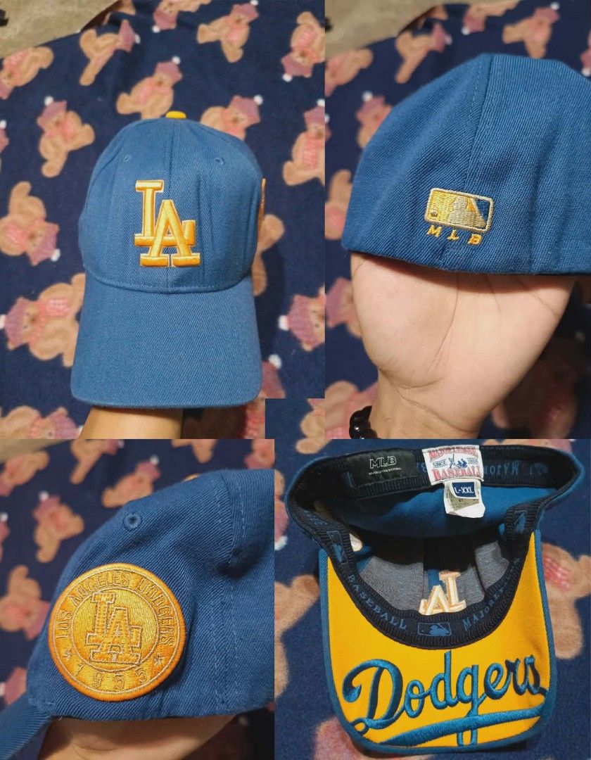 LA DODGERS CLOSE CAP (Category: Caps & Hats) located in Ramon. Submitted by vanjho.vtg (Listing ID 1421072294, Image 1). Description: - LA Dodgers close cap - Features the LA logo - MLB logo visible - Stylish and ready to wear.