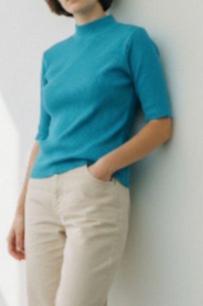 Lzda Teal Turtleneck Top - Size M (new) (Category: Sleeveless) located in Taguig. Submitted by cwonlinestore (Listing ID 1420986097, Image 2). Description: - Lzda teal turtleneck top - Size: M - Features: Short sleeves, ribbed knit texture, mock neck - Style: Fitted silhouette - Color: Vibrant teal - Material: Knit fabric - Versatile: Can be dressed up or down.