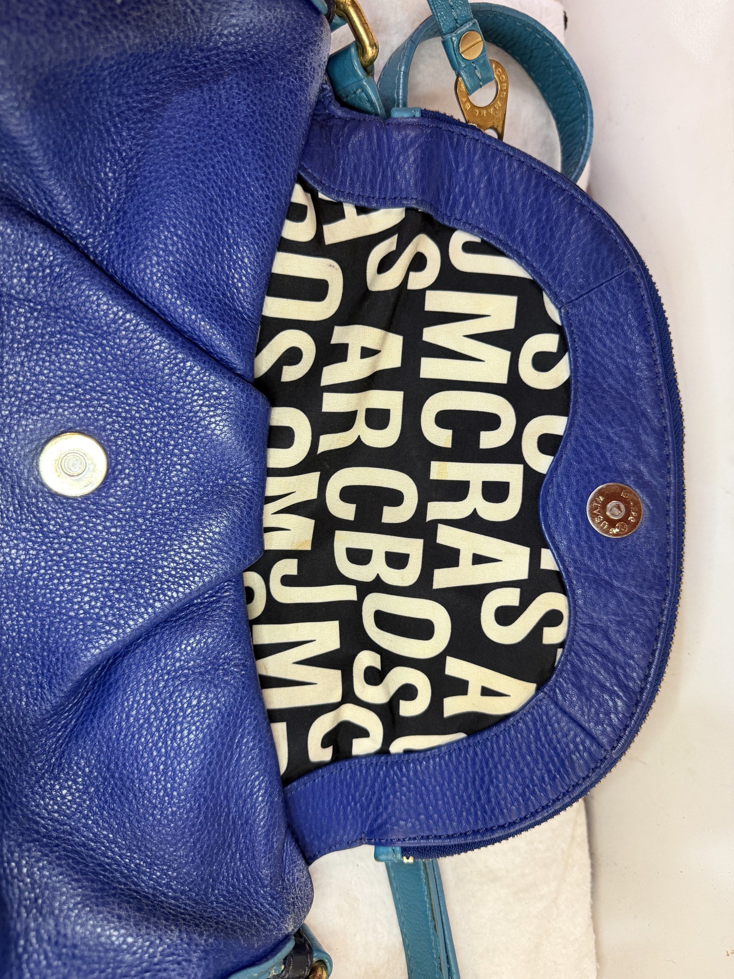 Marc by Marc Jacobs Two-Tone Bright Blue Natasha (Category: Luxury Bags & Wallets) located in Manila. Submitted by biancasbags101 (Listing ID 1420946098, Image 3). Description: - Marc by Marc Jacobs Natasha crossbody bag - Two-tone bright blue color - Made of leather - Classic design - Spacious interior - Signs of wear - Versatile for everyday use Guaranteed Authentic. Price slightly negotiable..