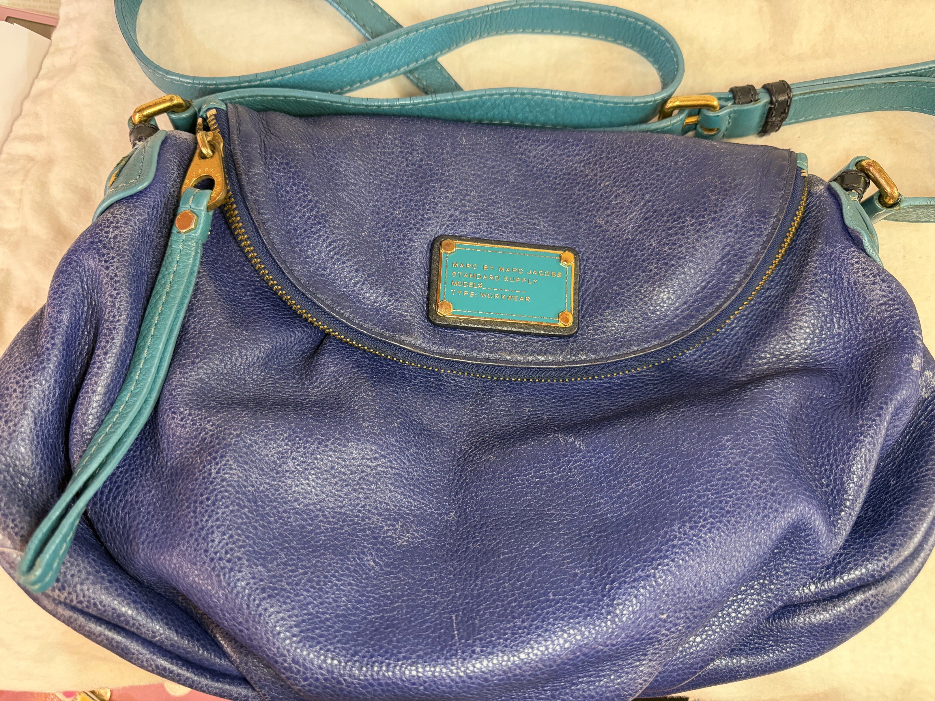 Marc by Marc Jacobs Two-Tone Bright Blue Natasha (Category: Luxury Bags & Wallets) located in Manila. Submitted by biancasbags101 (Listing ID 1420946098, Image 2). Description: - Marc by Marc Jacobs Natasha crossbody bag - Two-tone bright blue color - Made of leather - Classic design - Spacious interior - Signs of wear - Versatile for everyday use Guaranteed Authentic. Price slightly negotiable..
