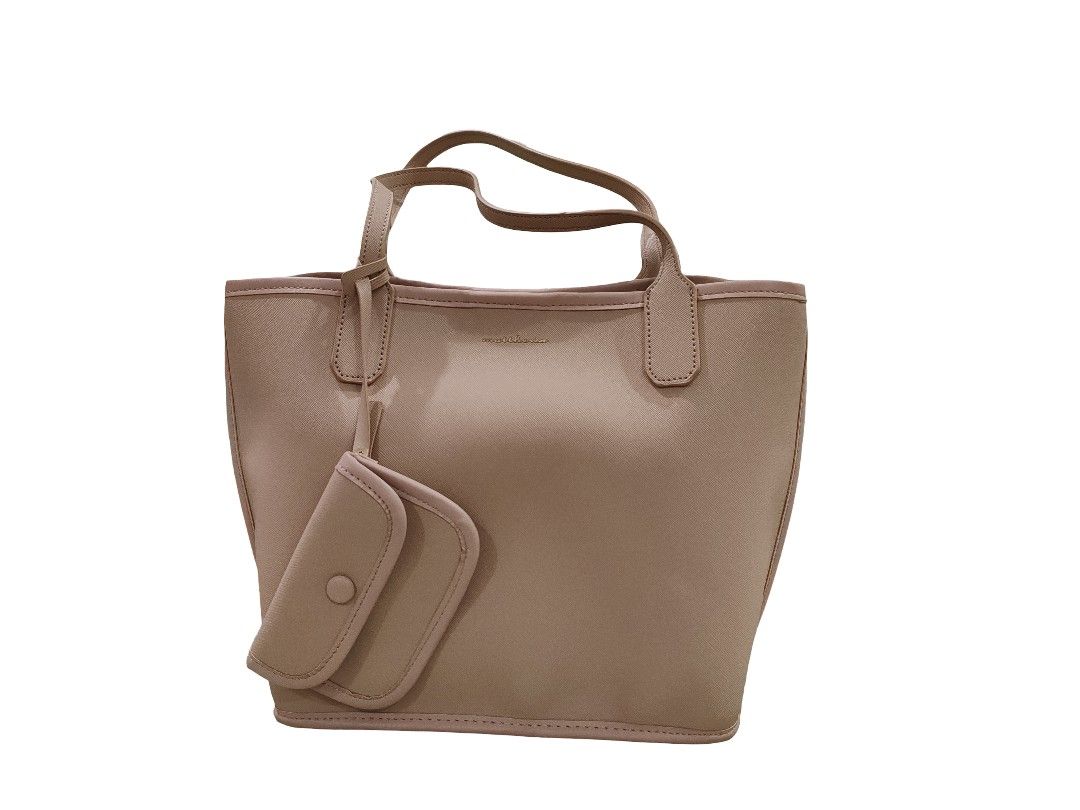 Matthews Bag (Category: Tote Bags) located in Paranaque City. Submitted by winter_pinecone (Listing ID 1421003703, Image 1). Description: - never been used bag from matthews - best for casual use - comes with detachable mini-pouch - just the right size, not too small, not too big - comes with matthews black cloth wrap - originally bought in sm makati for 999.