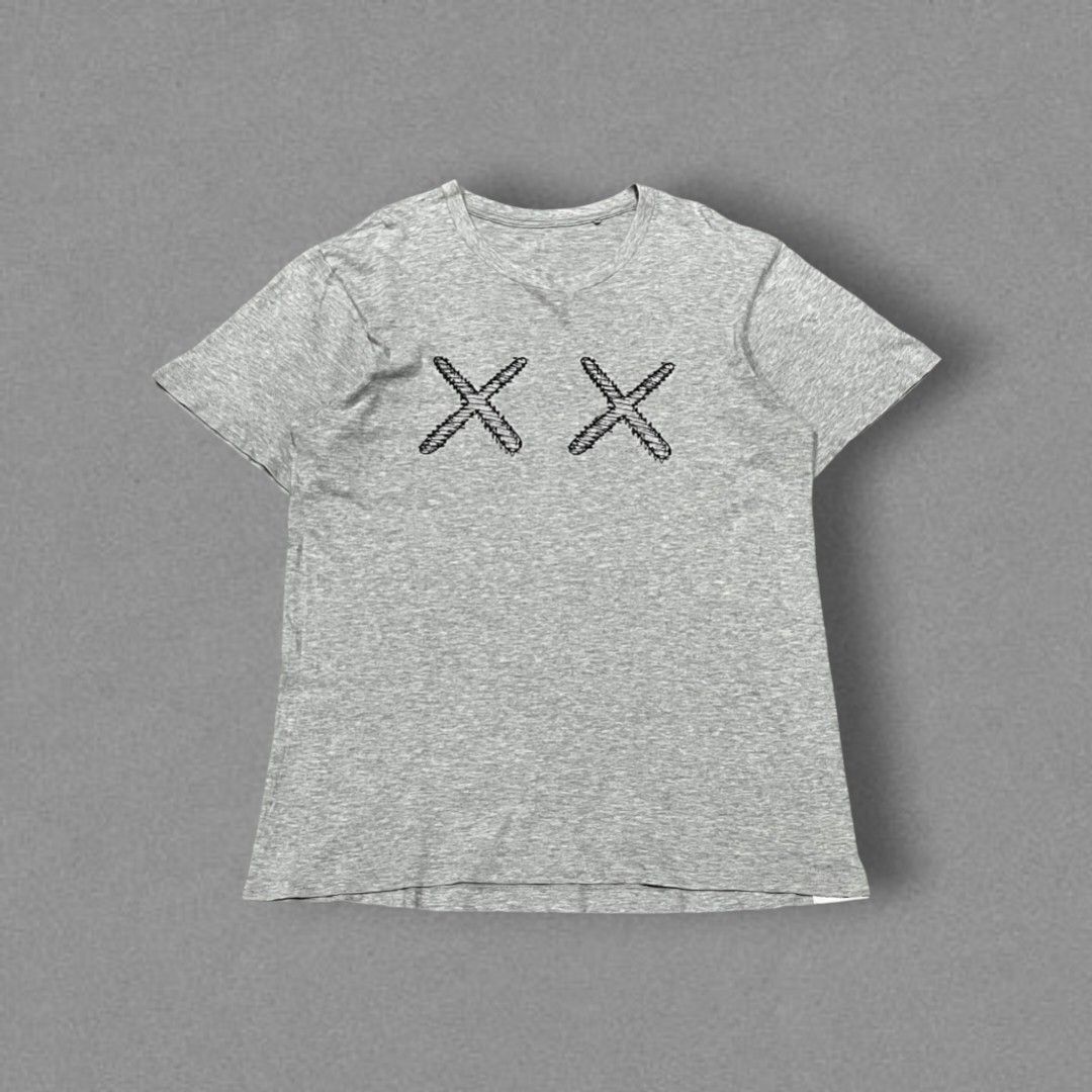 [MEDIUM] Uniqlo UT x Kaws Graphic Tee (Category: Tshirts & Polo Shirts ) located in Iligan City. Submitted by preems (Listing ID 1415367494, Image 1). Description: Size: Medium Actual Dimes: L-27 W-20 Overall Condition: 10/10 Iligan City, Lanao del Norte Location Shipping via J&T Express [100] plus shipping fee OBO ( or best offer).