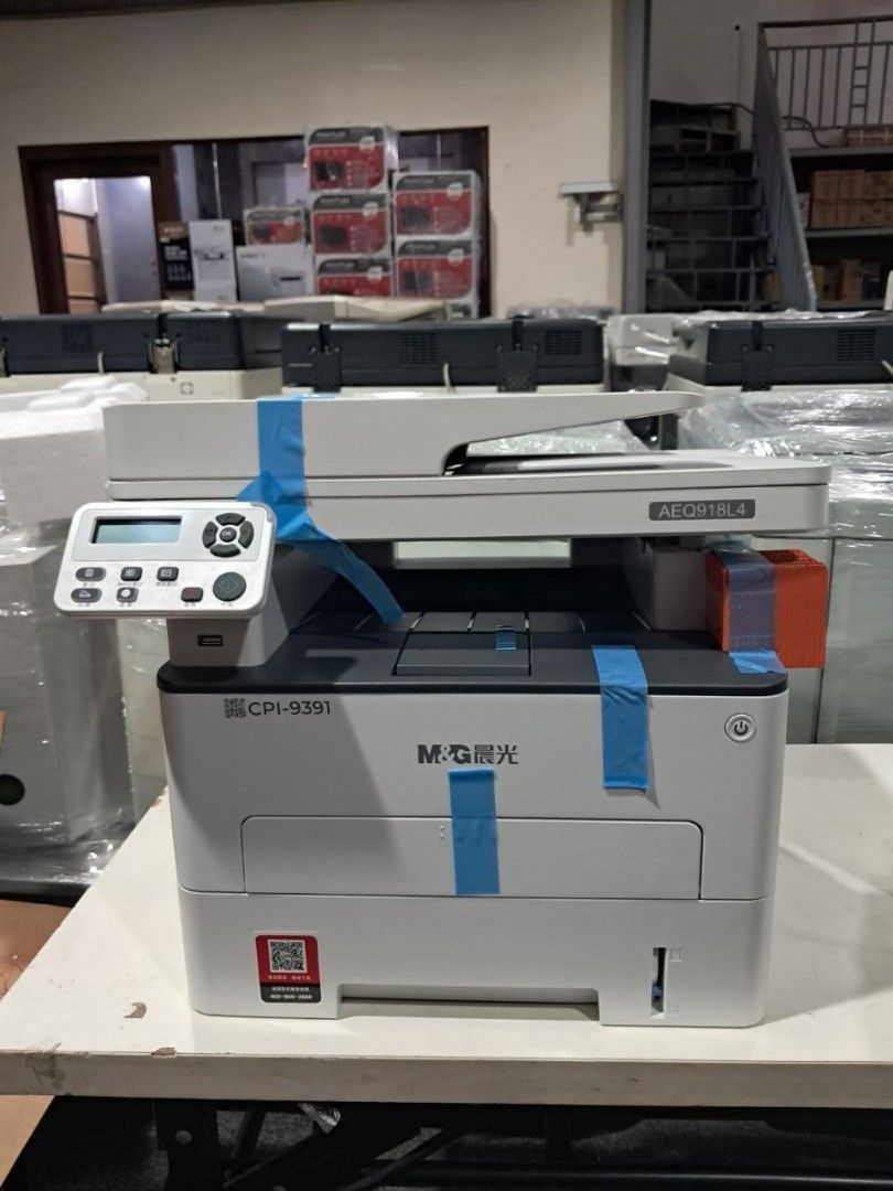 M&G CPI-9391 Laser Printer (Category: Printers, Scanners & Copiers) located in Quezon City. Submitted by copieronlineinc (Listing ID 1420953706, Image 1). Description: - M&G CPI-9391 Laser Printer - Control panel with multiple buttons and display screen - Includes a paper tray - Power button included - White color with blue tape - Model number clearly visible.