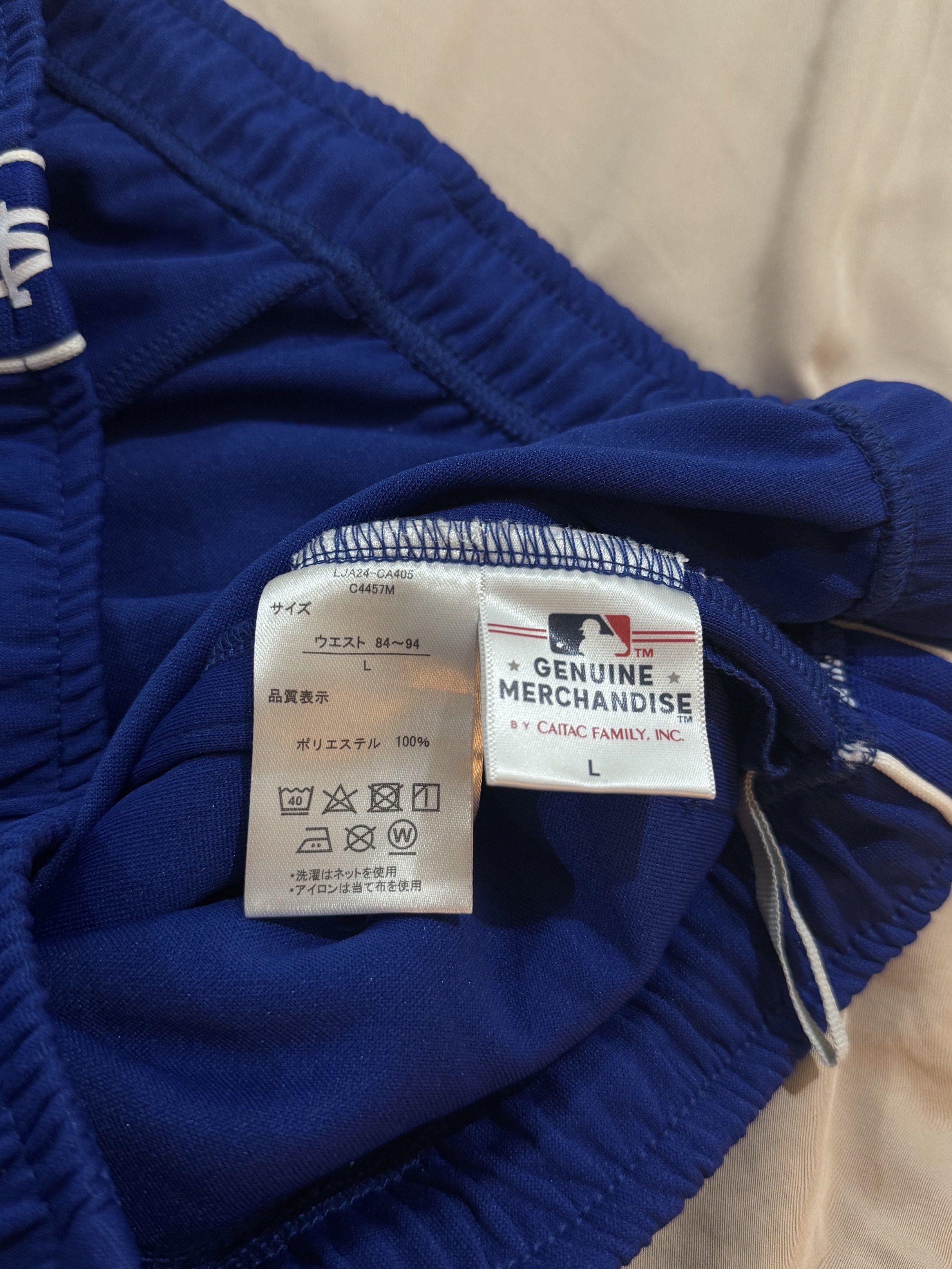 MLB Los Angeles Dodgers side-tape track pants (Category: Joggers) located in Manila. Submitted by archivesbyelle (Listing ID 1421075864, Image 3). Description: - MLB Los Angeles Dodgers track pants - Size: M - Features side tape design with LA logo - Color: Blue - Condition: Excellent - Genuine merchandise - Never been used, I bought this from the mall but unfortunately I cut off the tag already.