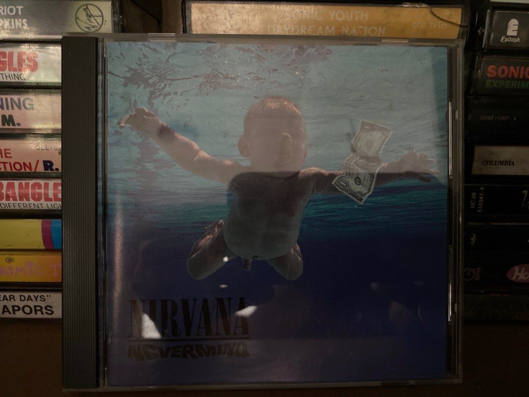 Nirvana - Nevermind CD (Category: CDs & DVDs) located in Tabaco. Submitted by cinemahilig (Listing ID 1420962447, Image 1). Description: - Original Nirvana "Nevermind" CD - Features iconic album art - Includes original case and disc - Perfect for Nirvana fans and collectors Last price posted. Buyer shoulders shipping. Item location: Tabaco City, Albay. 09395763344.