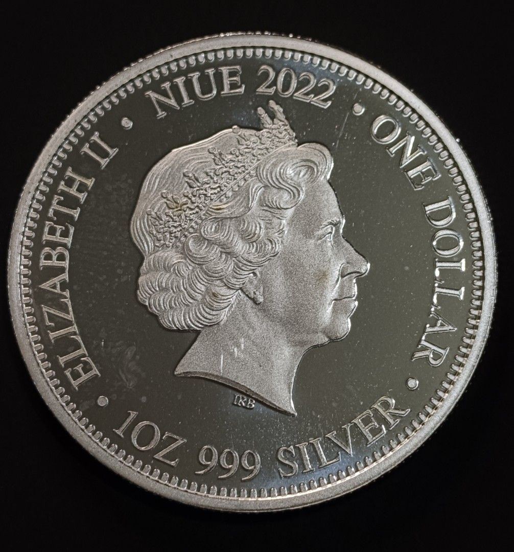 Niue 2022 One Dollar Fine Silver Coin (Category: Currency) located in Paranaque City. Submitted by phcoincollective (Listing ID 1421085840, Image 2). Description: - 2022 Niue One Dollar coin - Features a detailed Tiger and Komodo dragon design - Reverse side: Queen Elizabeth II - Inscription: "ONE DOLLAR" and "1 OZ 999 SILVER" - Made of 1 oz 999 silver.