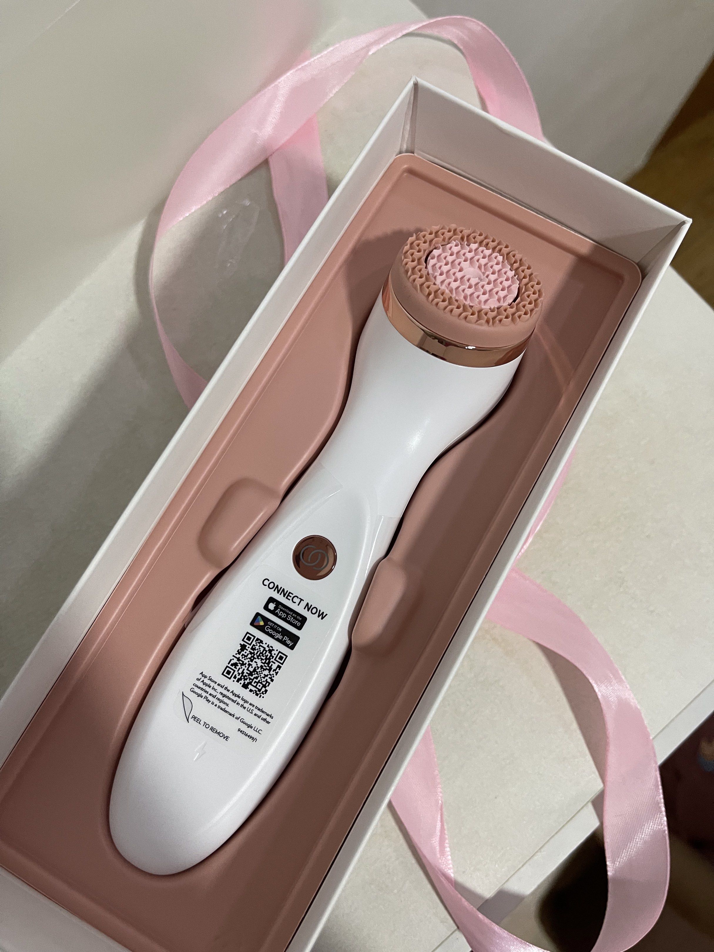 NU SKIN LUMISPA IO (Category: Face Care) located in Manila. Submitted by athenafinds (Listing ID 1421014666, Image 1). Description: Used 2 times only bought from NU UK Limited edition rose gold color super pretty - White facial cleansing device - Pink brush head - Original packaging - Includes a button - Features a QR code for app connection - Designed for facial cleansing.