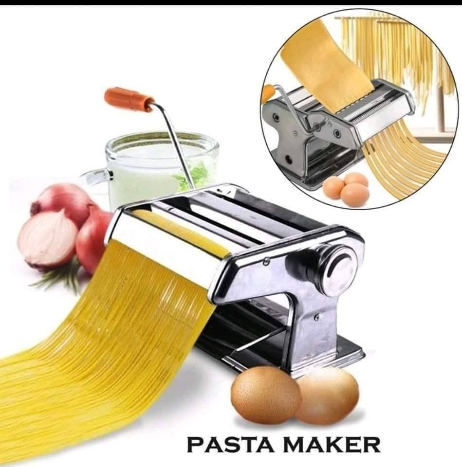 Pasta Maker - Stainless Steel (Category: Other Kitchenware & Tableware) located in Manila. Submitted by haideshop (Listing ID 1421113727, Image 2). Description: Make fresh pasta at home with this stainless steel pasta maker. The images show it can make both flat pasta sheets and spaghetti-like noodles. It includes a clamp to secure it to a table. The box indicates it is 180mm..