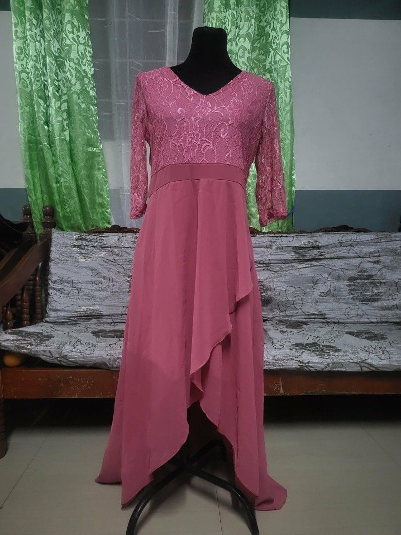 Pink Formal Dresses (Category: Dresses) located in Pasig City. Submitted by siyerli8 (Listing ID 1420969155, Image 1). Description: - Elegant pink formal dresses - V-neckline with lace detailing - Flowing skirt - Flattering silhouette - Available styles: short sleeves, wrap-style front - Ideal for formal events and evening wear.
