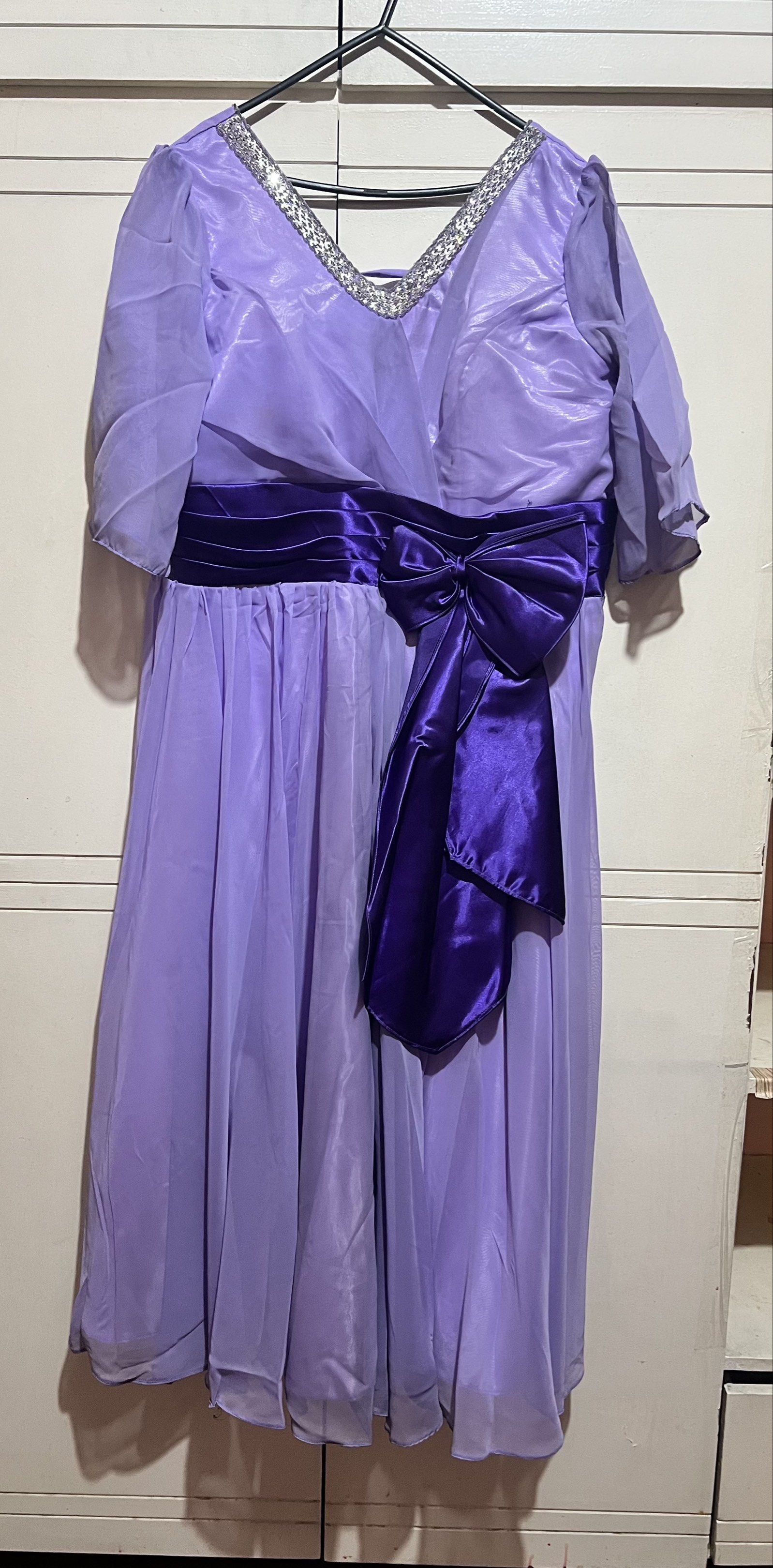 Purple Formal Dress with Bow (Category: Dresses) located in Quezon City. Submitted by melalog (Listing ID 1421016732, Image 1). Description: - Purple formal dress - V-neckline with silver embellishments - Wide purple satin sash with bow - Lace-up back for adjustable fit - Short, sheer sleeves - Flowing skirt - Ideal for special events Bust 42 inches Shoulders 17 inches Waist 42 inches Lenght 52.5 inches Sellng for 900 plus shipping. Pm if interes