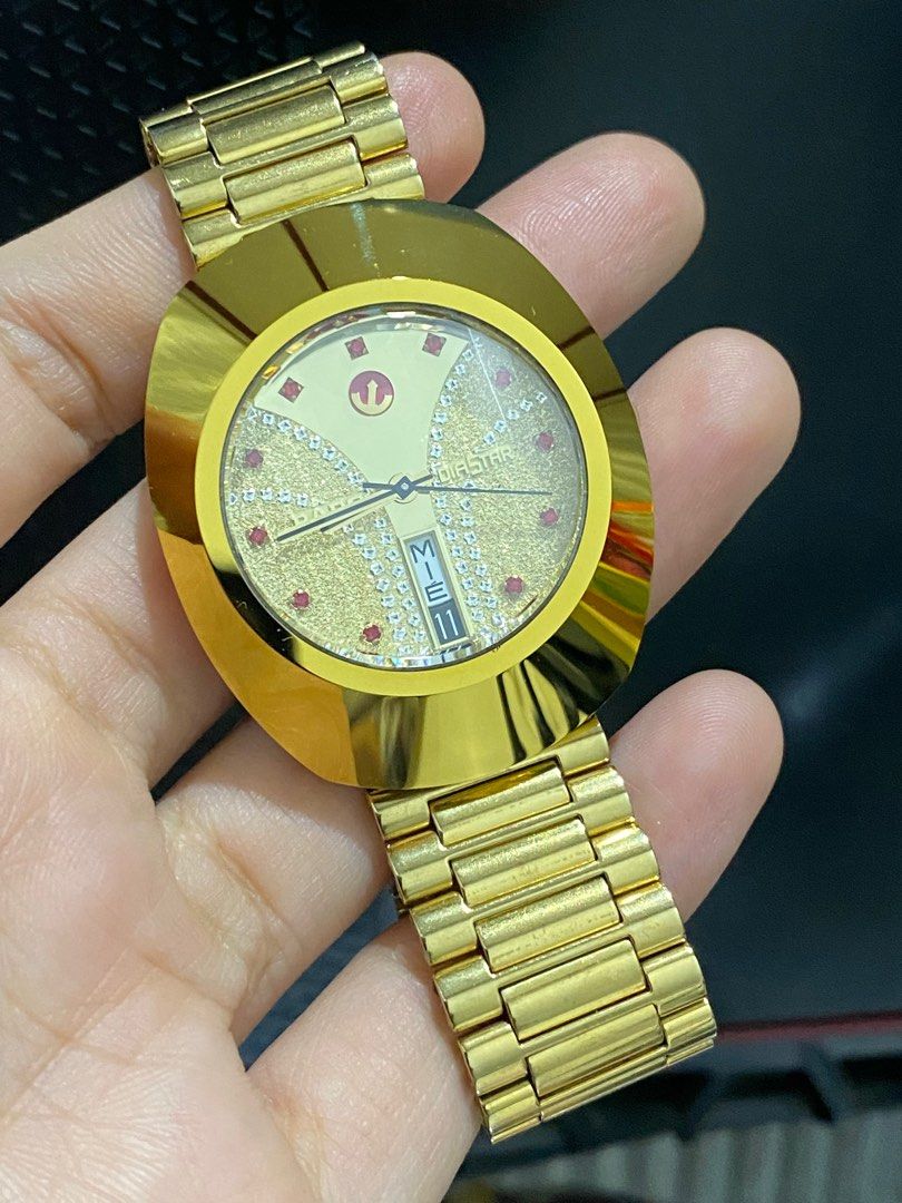 Rado Diastar Original (Category: Luxury Watches) located in Bulacan. Submitted by youlovewatches (Listing ID 1421109113, Image 3). Description: Rado Diastar (Original) Details: Red Crystal Digits Gold Dial, Rare Automatic Movement 35.5mm Case Diameter 6'0 Date Calendar Deployant Clasp Strap 9/10 Mint - Very Good Condition Guaranteed Authentic Set with: "Presentation box" Mall Price: 80,000-95,000 php Our Price: 38,000 Php Money Back Guaranteed if