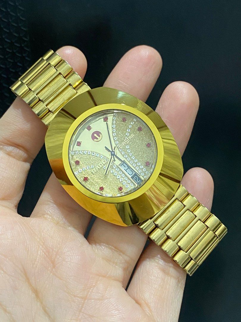 Rado Diastar Original (Category: Luxury Watches) located in Bulacan. Submitted by youlovewatches (Listing ID 1421109113, Image 2). Description: Rado Diastar (Original) Details: Red Crystal Digits Gold Dial, Rare Automatic Movement 35.5mm Case Diameter 6'0 Date Calendar Deployant Clasp Strap 9/10 Mint - Very Good Condition Guaranteed Authentic Set with: "Presentation box" Mall Price: 80,000-95,000 php Our Price: 38,000 Php Money Back Guaranteed if