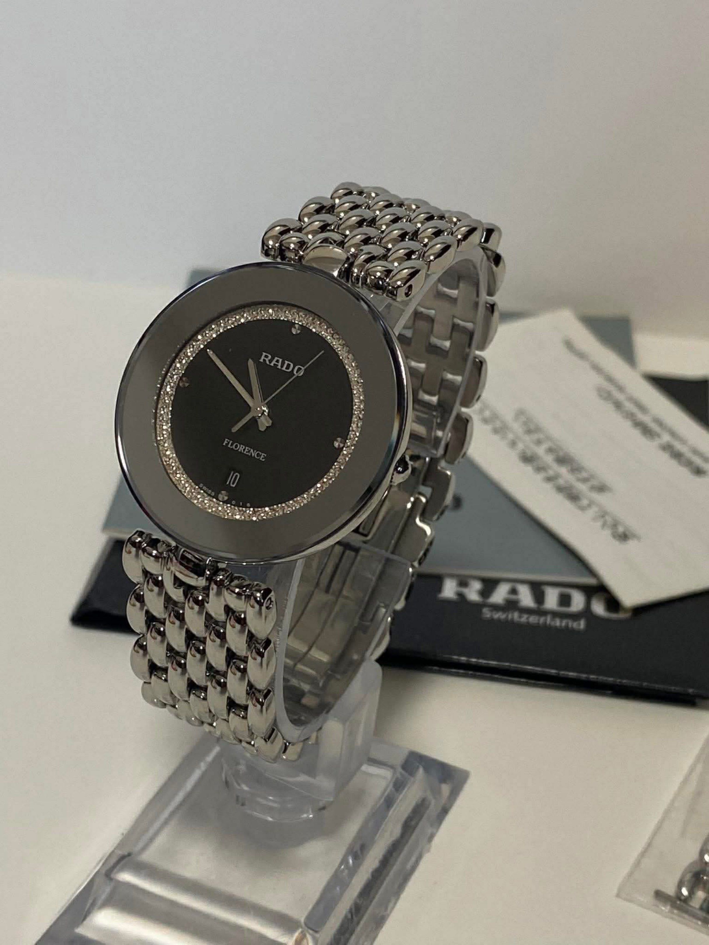 Rado Florence Diamond Watch (Category: Luxury Watches) located in Cebu City. Submitted by forless.ph (Listing ID 1421043737, Image 1). Description: - original Rado Florence watch - Black dial with diamond accents - Stainless steel bracelet - Includes original box and papers - Extra links included - Date display at 6 o'clock - Swiss made - Moneyback guaranted 💯.