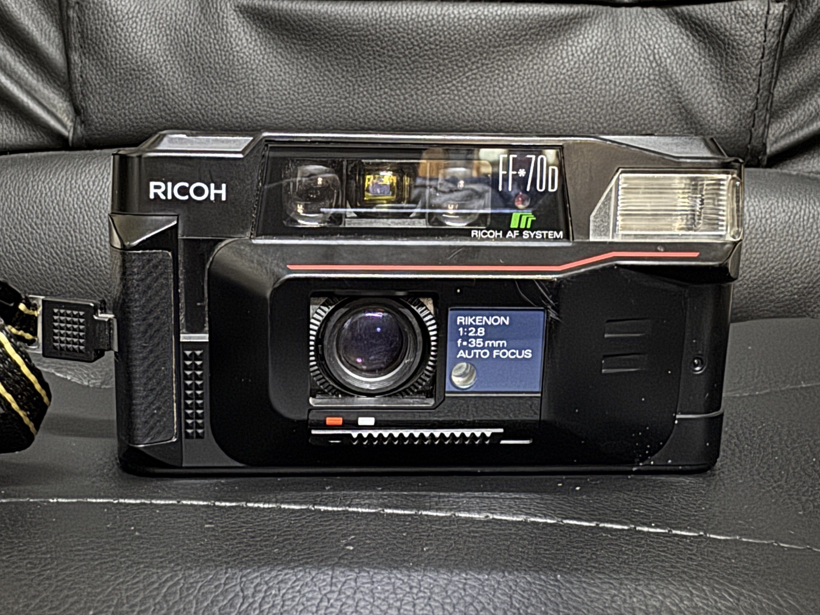 Ricoh FF-70D 35mm Film Camera (Category: Cameras) located in Manila. Submitted by prcsabby (Listing ID 1420988102, Image 1). Description: Ricoh FF-70D 35mm Film Camera - Rikenon 1:2.8 f=35mm autofocus lens - Built-in flash - Fully working - Uses two AA batteries (included) - Tested with sample shots (pls dm me) Issue/s: - The lens has some fungus, which may be causing the photos to appear blurry or hazy. It needs to be CLA’d. - The DX code reader