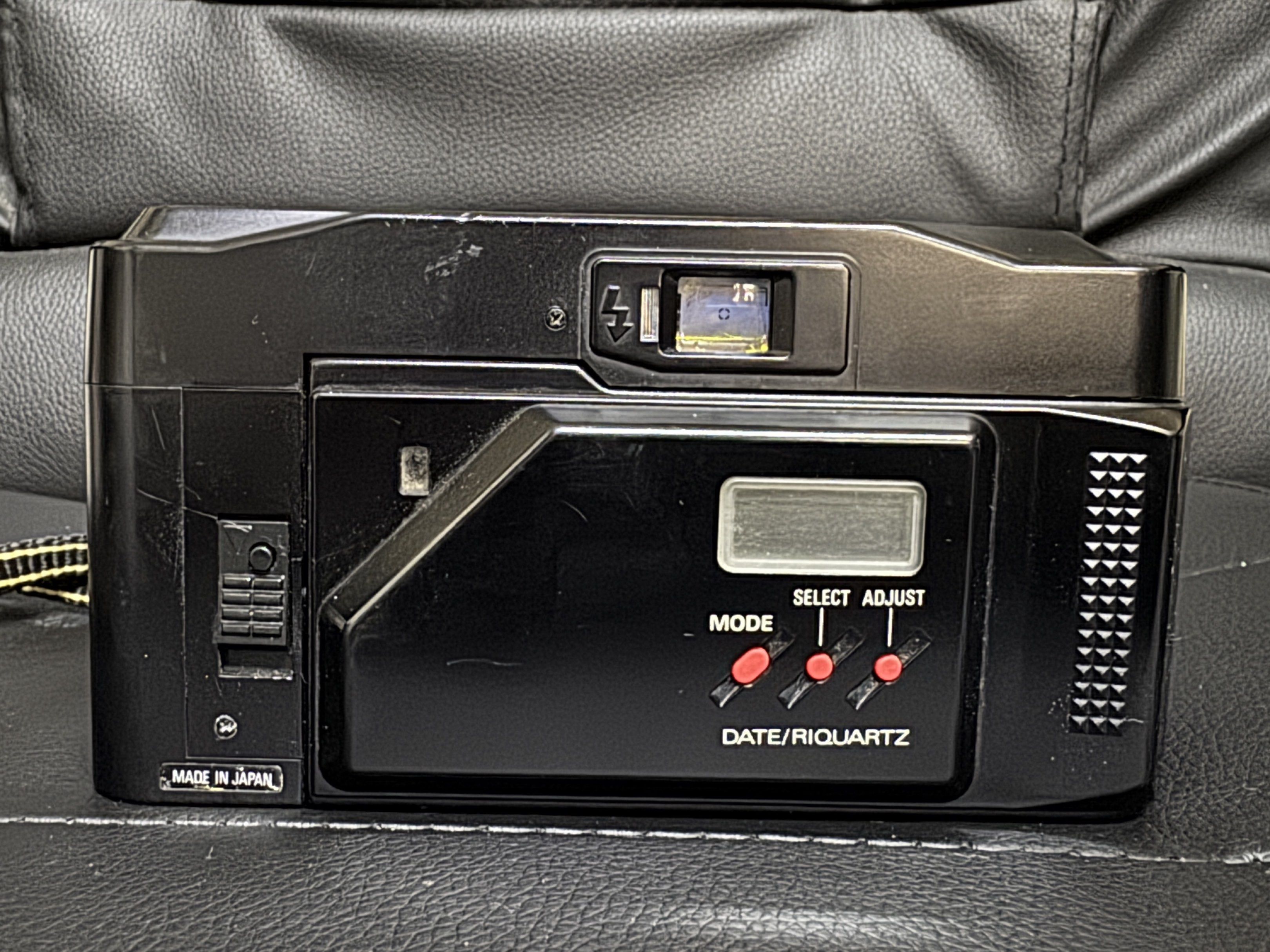 Ricoh FF-70D 35mm Film Camera (Category: Cameras) located in Manila. Submitted by prcsabby (Listing ID 1420988102, Image 2). Description: Ricoh FF-70D 35mm Film Camera - Rikenon 1:2.8 f=35mm autofocus lens - Built-in flash - Fully working - Uses two AA batteries (included) - Tested with sample shots (pls dm me) Issue/s: - The lens has some fungus, which may be causing the photos to appear blurry or hazy. It needs to be CLA’d. - The DX code reader