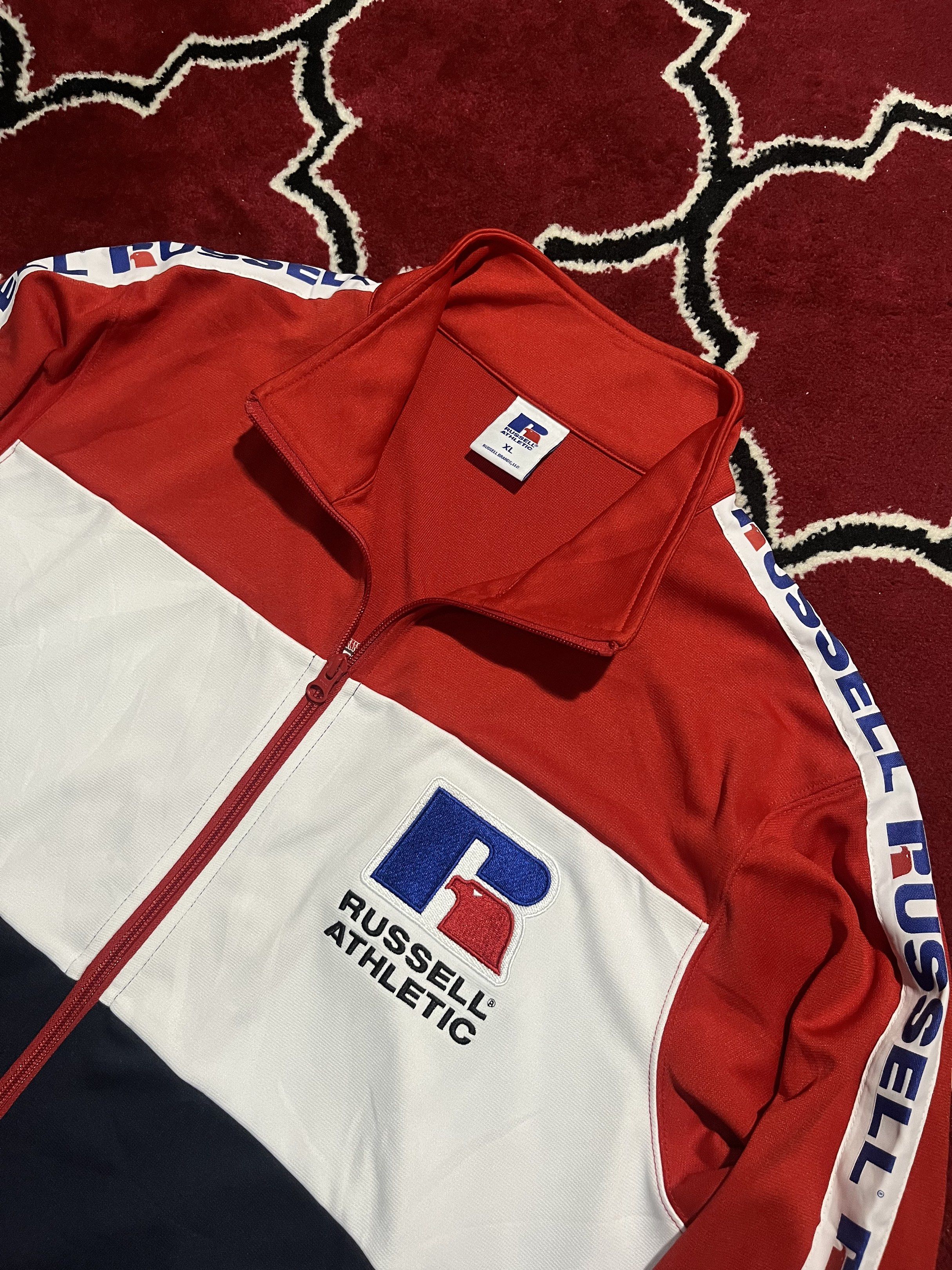 Russell Athletic Track Jacket (Category: Coats, Jackets and Outerwear) located in Mabalacat. Submitted by themeadowstash (Listing ID 1420959478, Image 2). Description: Russell Athletic Track Jacket size XL on tag dimensions: 23” x 28” DM for more photos.