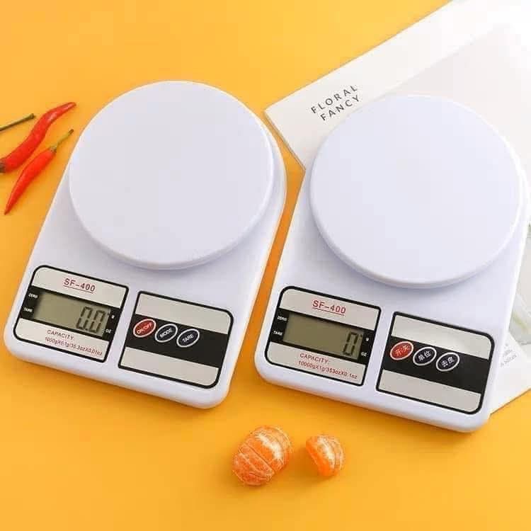 SF-400 Electronic Kitchen Scale (Category: Other Kitchenware & Tableware) located in Manila. Submitted by yzcartph (Listing ID 1421117563, Image 2). Description: - SF-400 Digital Kitchen Scale - Features a digital display - White platform - Comes with original box - Ideal for cooking and baking.