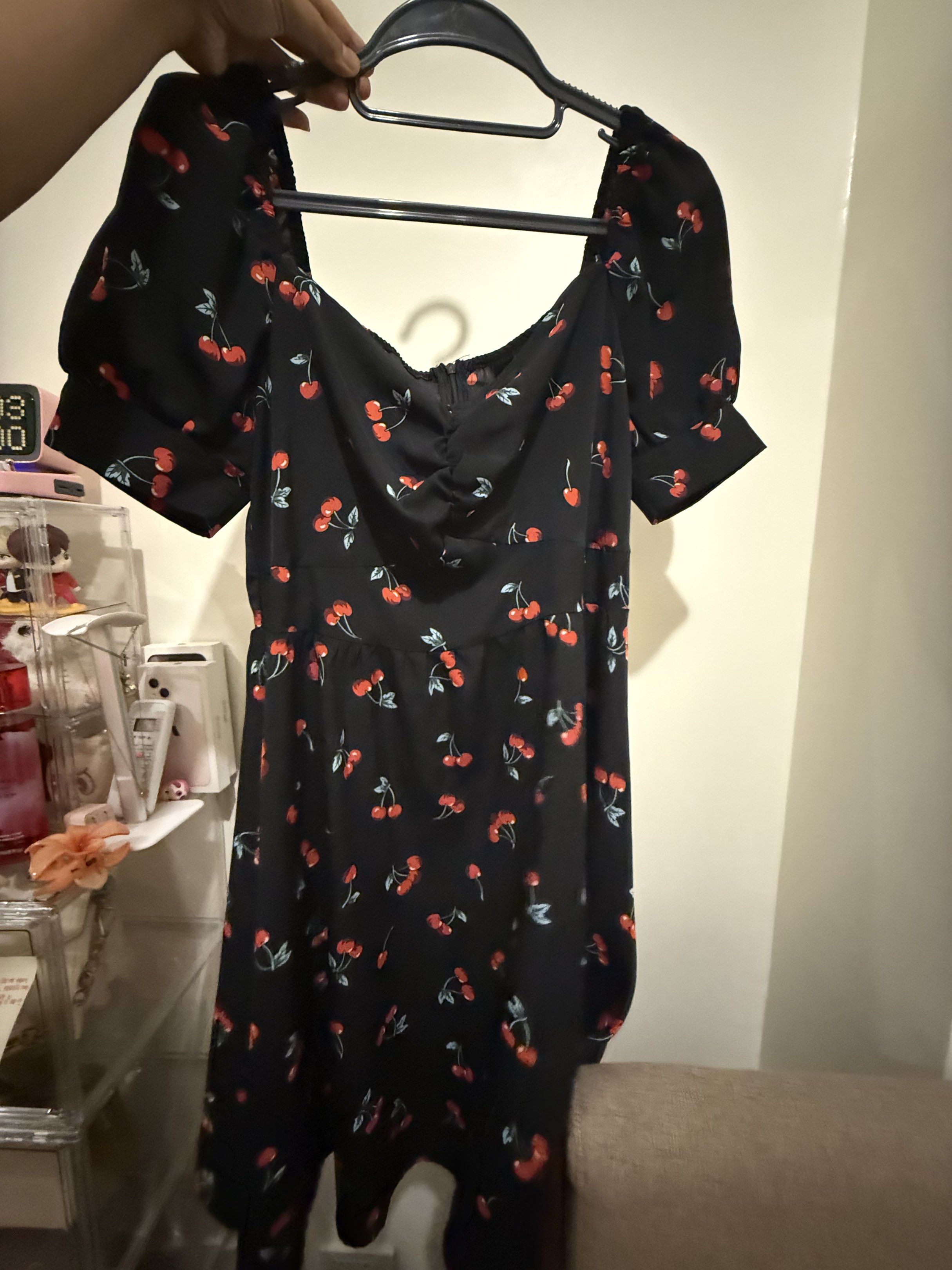 Shein Cherry Print Puff Sleeve Dress (Category: Dresses) located in Manila. Submitted by heysoulsissy (Listing ID 1421045290, Image 2). Description: - Black dress - Cherry print - Puff sleeves - Sweetheart neckline - Fitted bodice - Flared skirt - Lightweight fabric - Perfect for warm weather.