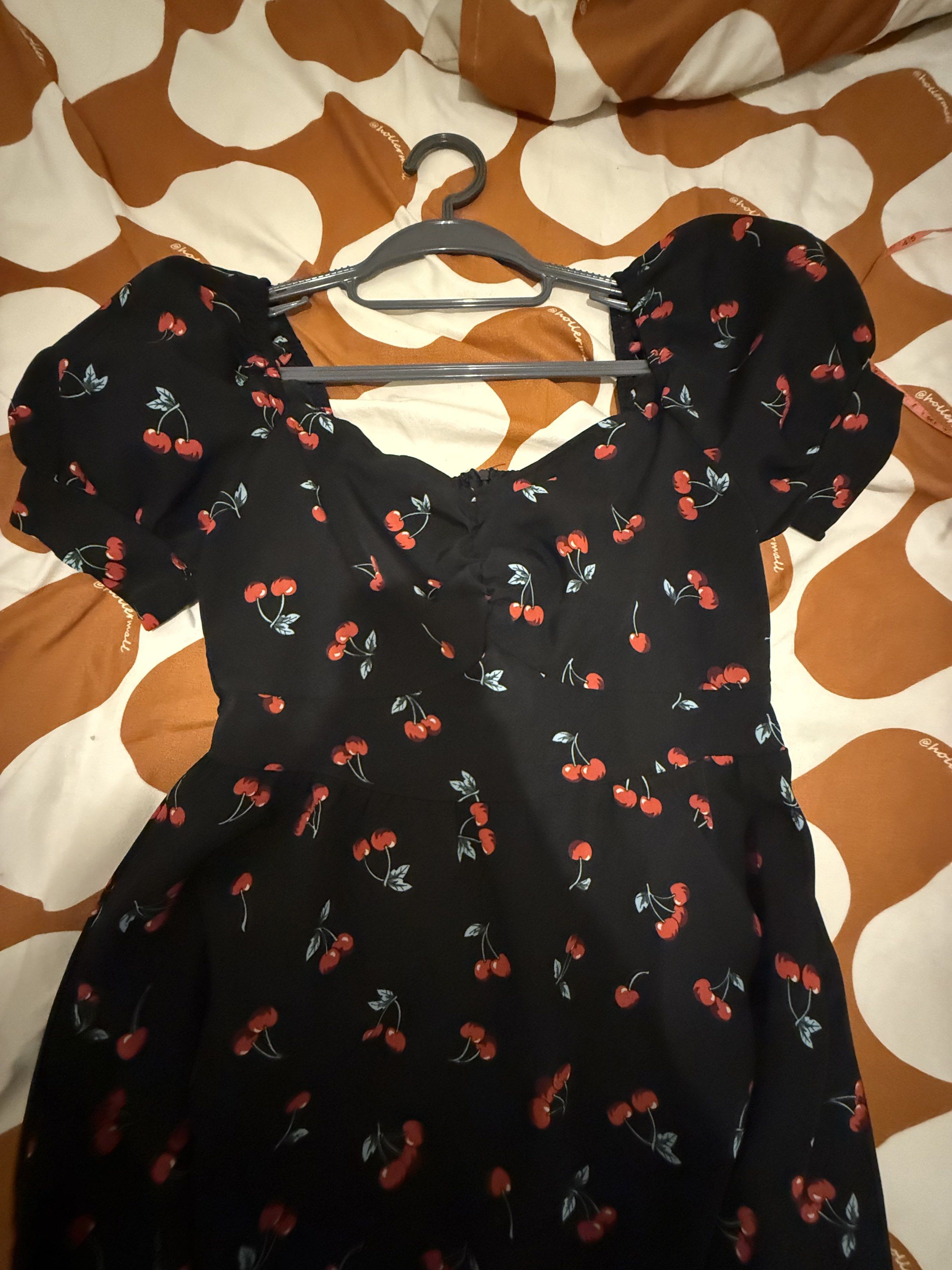 Shein Cherry Print Puff Sleeve Dress (Category: Dresses) located in Manila. Submitted by heysoulsissy (Listing ID 1421045290, Image 1). Description: - Black dress - Cherry print - Puff sleeves - Sweetheart neckline - Fitted bodice - Flared skirt - Lightweight fabric - Perfect for warm weather.