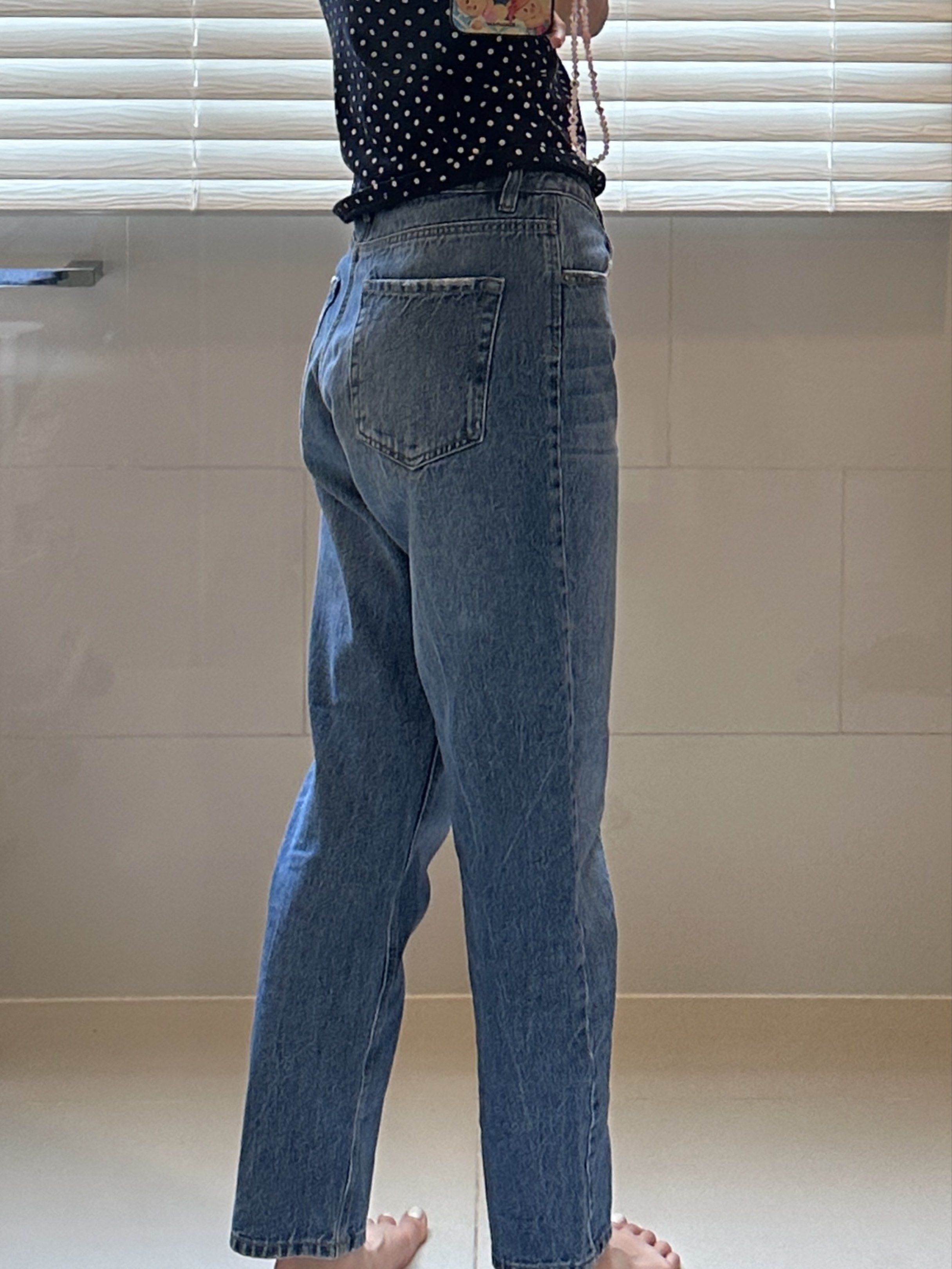 Stradivarius Dark High-Waisted Mom Jeans (Category: Jeans) located in Makati City. Submitted by fiffanify (Listing ID 1421014033, Image 3). Description: Stradivarius size 4 Can fit waist size ~26inches, hips ~36inches Not very stretchy but has a loose fit For delivery only.