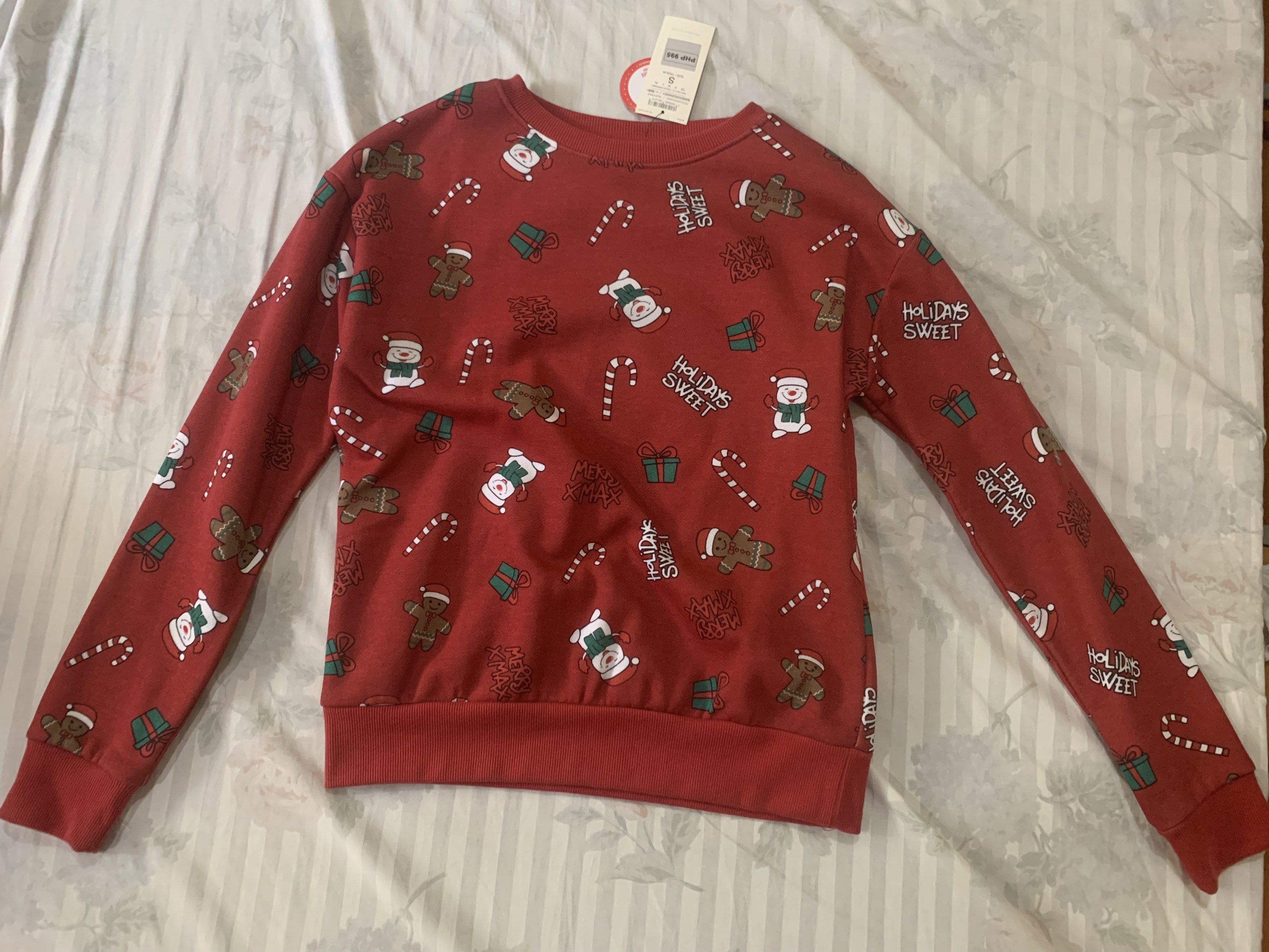 Terranova Christmas Sweatshirt - Size Small (Category: Longsleeves) located in Quezon City. Submitted by 02kdz (Listing ID 1421015339, Image 3). Description: - Terranova Christmas sweatshirt - Size: S - Color: Red - Neckline: Round - Sleeves: Long - Design: Festive Christmas theme with gingerbread men, snowmen, and candy canes - tag still intact, already half the price :).