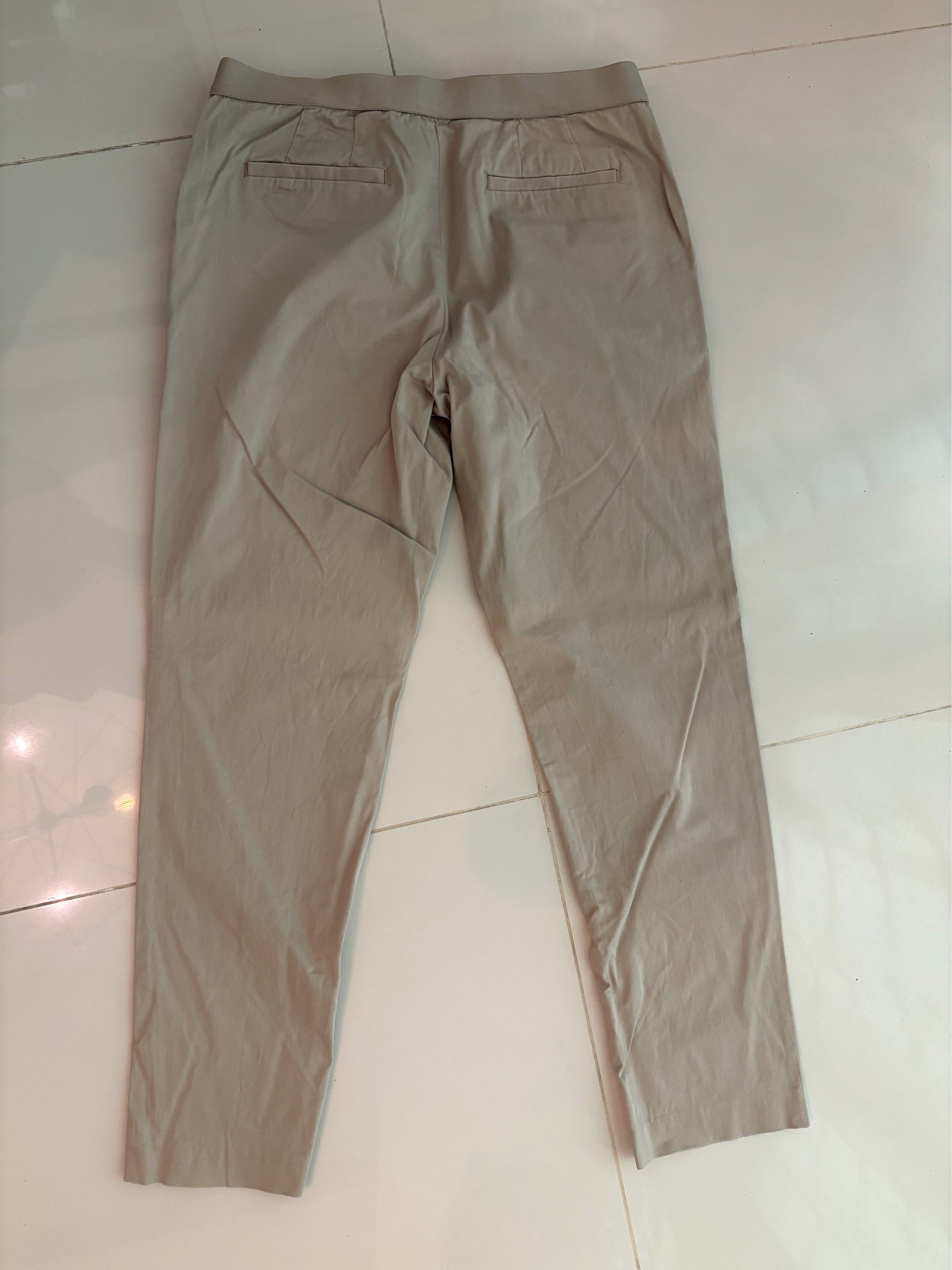 Uniqlo Pants (Beige) (Category: Other Bottoms) located in Paranaque City. Submitted by docyp (Listing ID 1421015766, Image 2). Description: For sale! 🤗 Uniqlo Pants Size: Medium Color: Beige Condition: 10/10. Just needs ironing 😅. Great office or casual wear pants! Waist area has an elastic band so it’s stretchy Waist: 28-29” Rise: 8 3/4” Hips: 36” Outseam: 35.5” Inseam: 26.5” Shipping to be shouldered by the buyer. Shipping can be via Lalamove