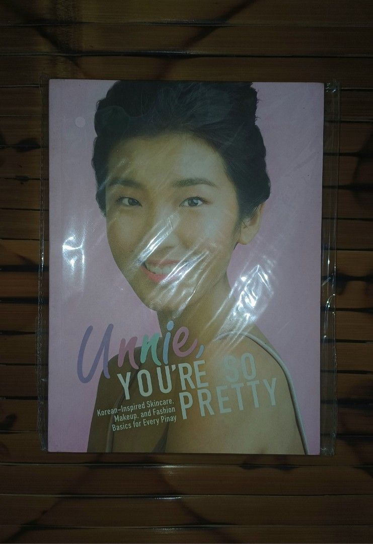 Unnie, You're So Pretty Book (Category: Storybooks) located in Santa Barbara. Submitted by pastelscribble (Listing ID 1420948102, Image 1). Description: 🏷wts lfb | wtb lfs ph only book kpop korean cosmetic beauty girl pink booklet summit bookstore booksale gift Book, "Unnie, You're So Pretty," focuses on Korean-inspired skincare, makeup, and fashion. It provides guidance for every pretty. The back of the book states, "Prettify the Korean Way!" a