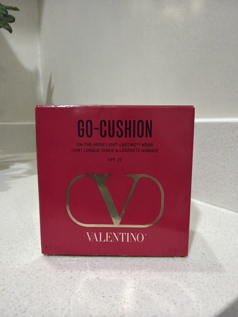 Valentino Go-Cushion (Category: Makeup) located in Cainta. Submitted by mycosy.life (Listing ID 1421062130, Image 1). Description: - Valentino Go-Cushion Foundation in shade LN2 - Very high end makeup - Provides light, long-lasting wear - Offers SPF 23 protection - Comes with original packaging - Features a red and gold Valentino compact design - Includes a sponge applicator.