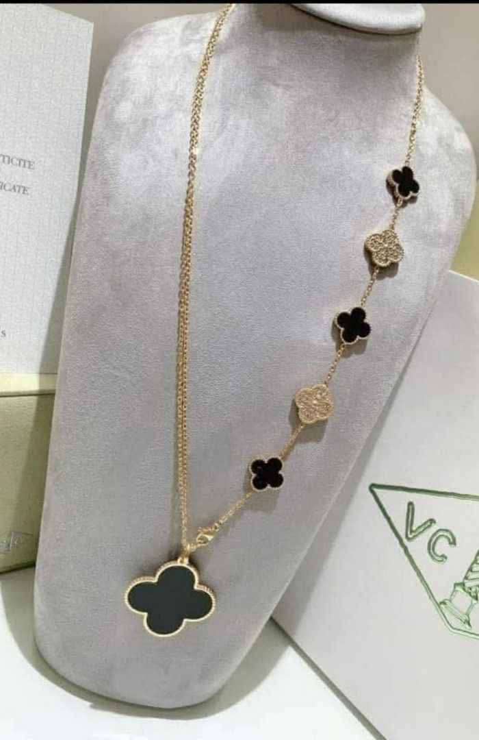 Van Cleef & Arpels Alhambra Necklace (Category: Necklaces) located in Manila. Submitted by poshcara (Listing ID 1421036647, Image 1). Description: _ alhambra inspired necklace - Gold chain stainless steel - Large black clover pendant - Smaller black and crystal clover - Perfect for any occasion.