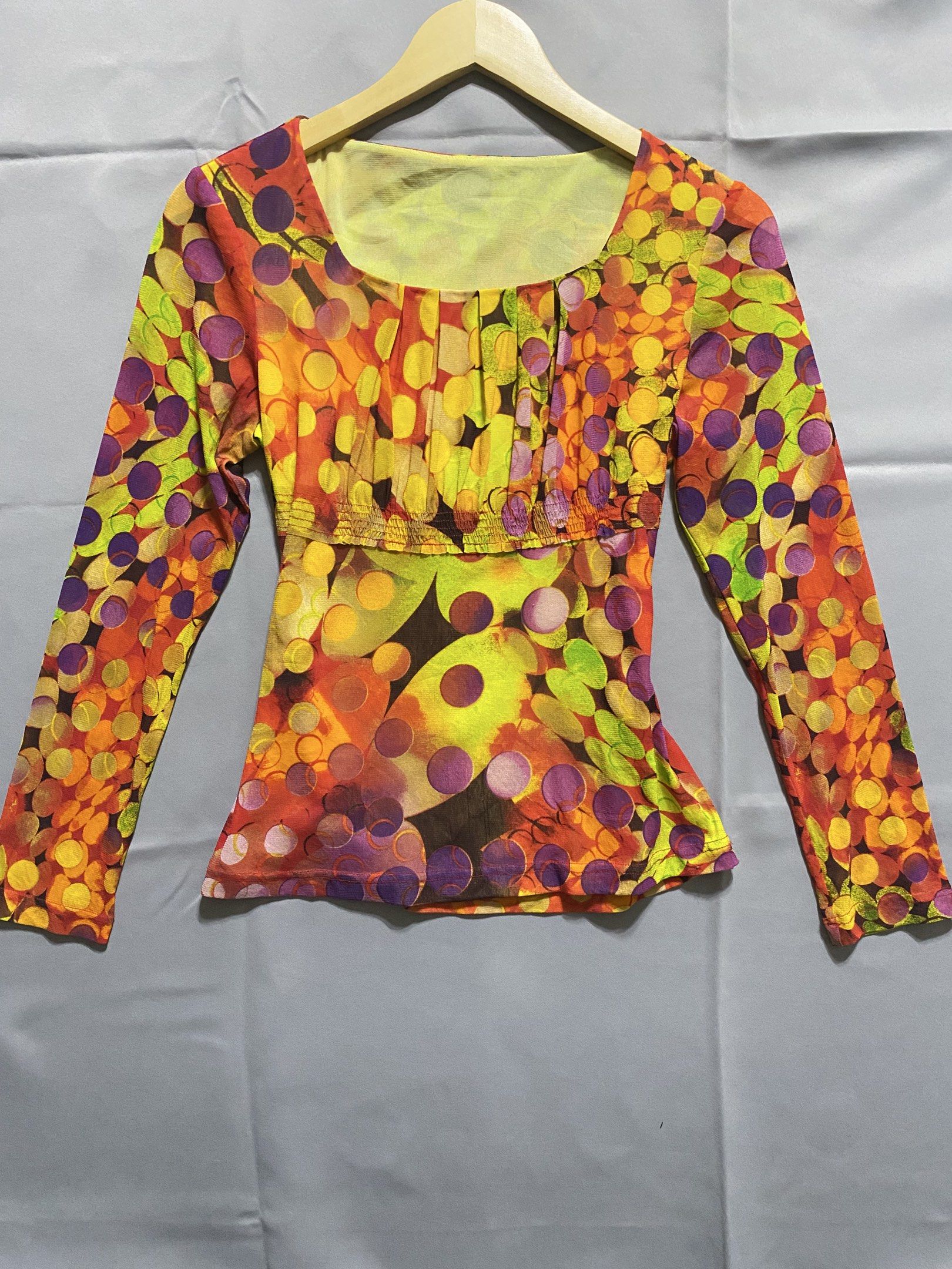 Y2k psychedelic mesh longsleeve top (Category: Longsleeves) located in Marilao. Submitted by kyssmarila (Listing ID 1420939499, Image 2). Description: — Size: XL on tag — Style: empire waist, square neck with pleated bust, very retro 90’s to early 2002s — Condition: 9/10 — Issue: None.