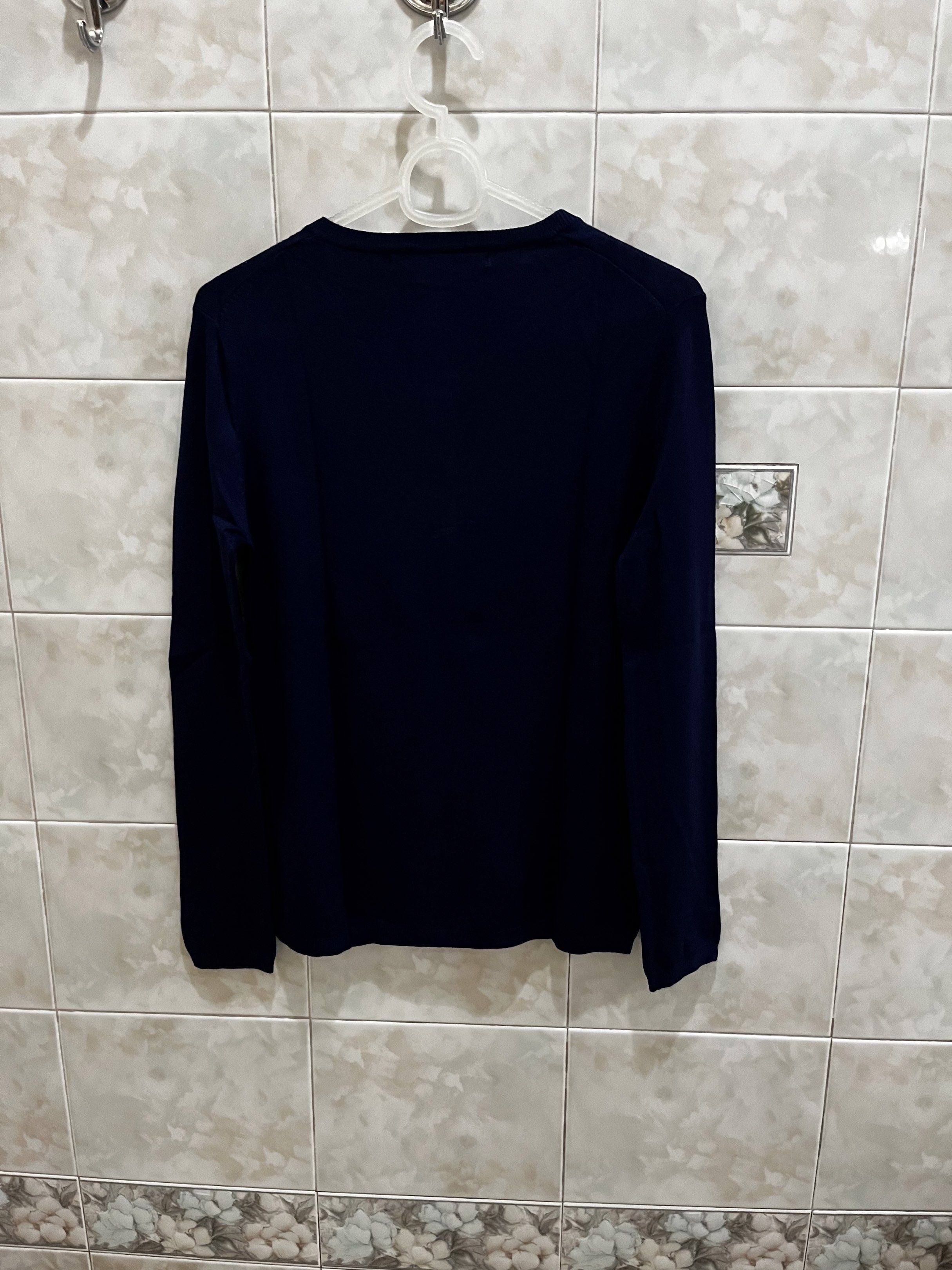 Zara Knit Navy Cardigan (Category: Coats, Jackets and Outerwear) located in Manila. Submitted by jcmph (Listing ID 1421007743, Image 2). Description: - Zara Knit navy blue cardigan - Size: M - Features: Round neck, button-down closure - Material: Viscose, Nylon, Elastane blend - Made in China Dimensions: Shoulders 14 inches Chest 16.5 inches Length 23 inches .