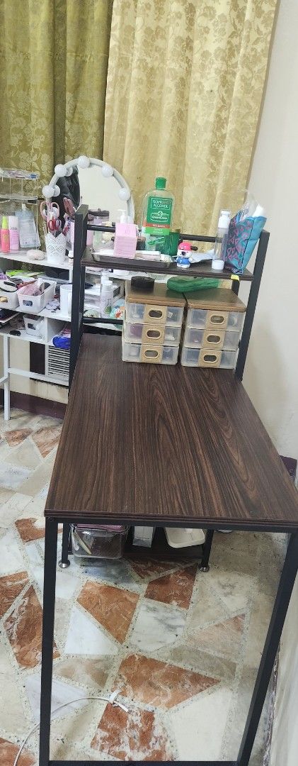 4 tier mahoganny study table (Category: Tables & Sets) located in Manila. Submitted by summerstyled (Listing ID 1421249442, Image 2). Description: - Industrial style desk - Dark wood-grain tabletop - Black metal frame - Multiple shelves for storage - Spacious work surface - Ideal for study or work - Stylish and functional design.