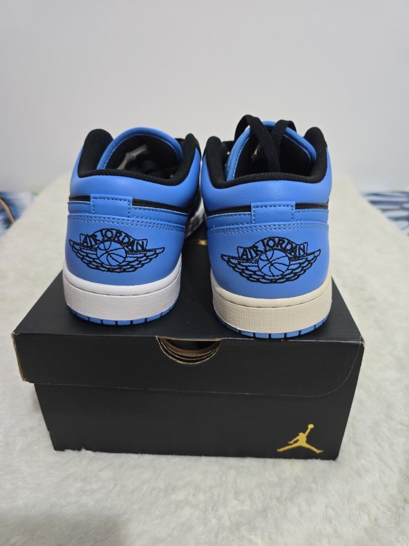 Air Jordan 1 Low - University Blue (Category: Sneakers) located in Quezon City. Submitted by simonpeterang (Listing ID 1421122981, Image 3). Description: - Air Jordan 1 Low - Colorway: University Blue and Black - Size: 10 - Includes original box - Iconic Jordan wings logo on the heel - Blue toe box, side panels, and heel - Black overlays and laces - White midsole - Blue outsole Price: 3800 php.