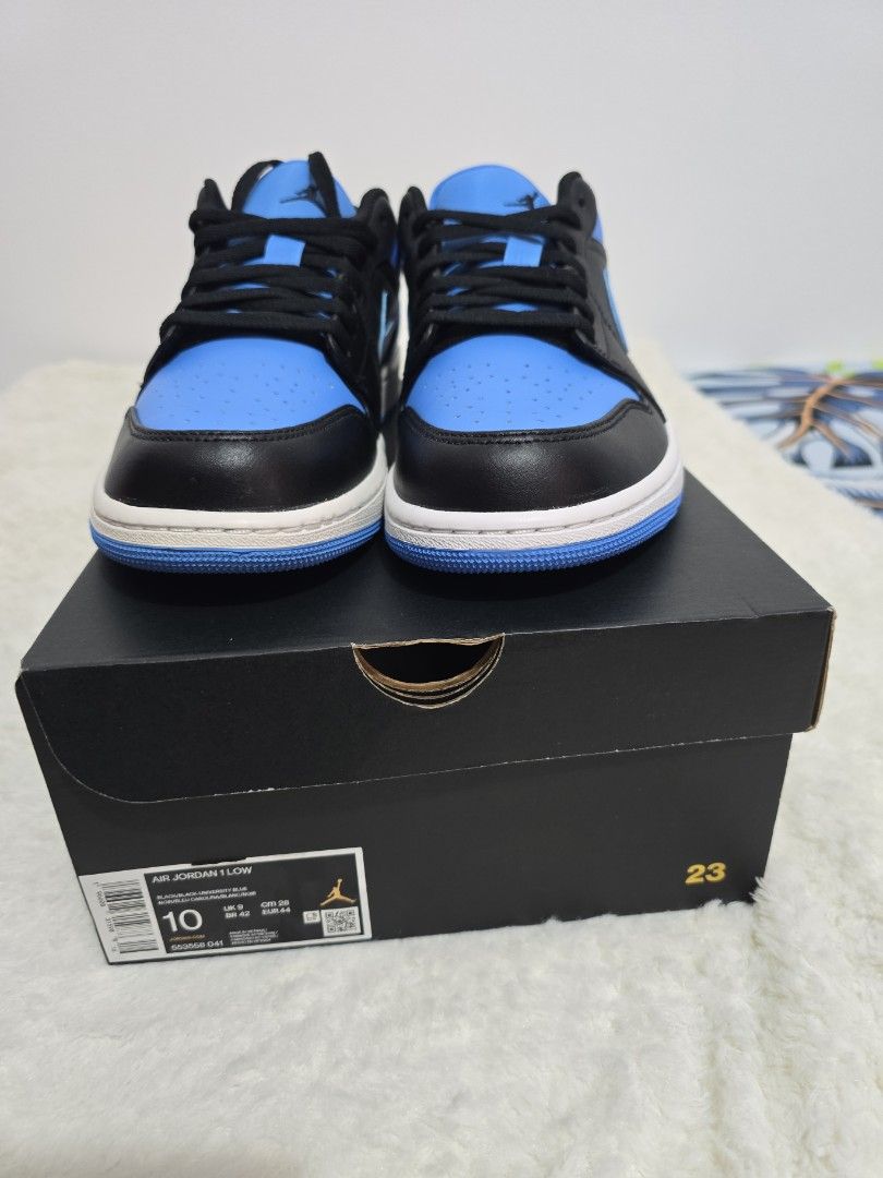 Air Jordan 1 Low - University Blue (Category: Sneakers) located in Quezon City. Submitted by simonpeterang (Listing ID 1421122981, Image 2). Description: - Air Jordan 1 Low - Colorway: University Blue and Black - Size: 10 - Includes original box - Iconic Jordan wings logo on the heel - Blue toe box, side panels, and heel - Black overlays and laces - White midsole - Blue outsole Price: 3800 php.