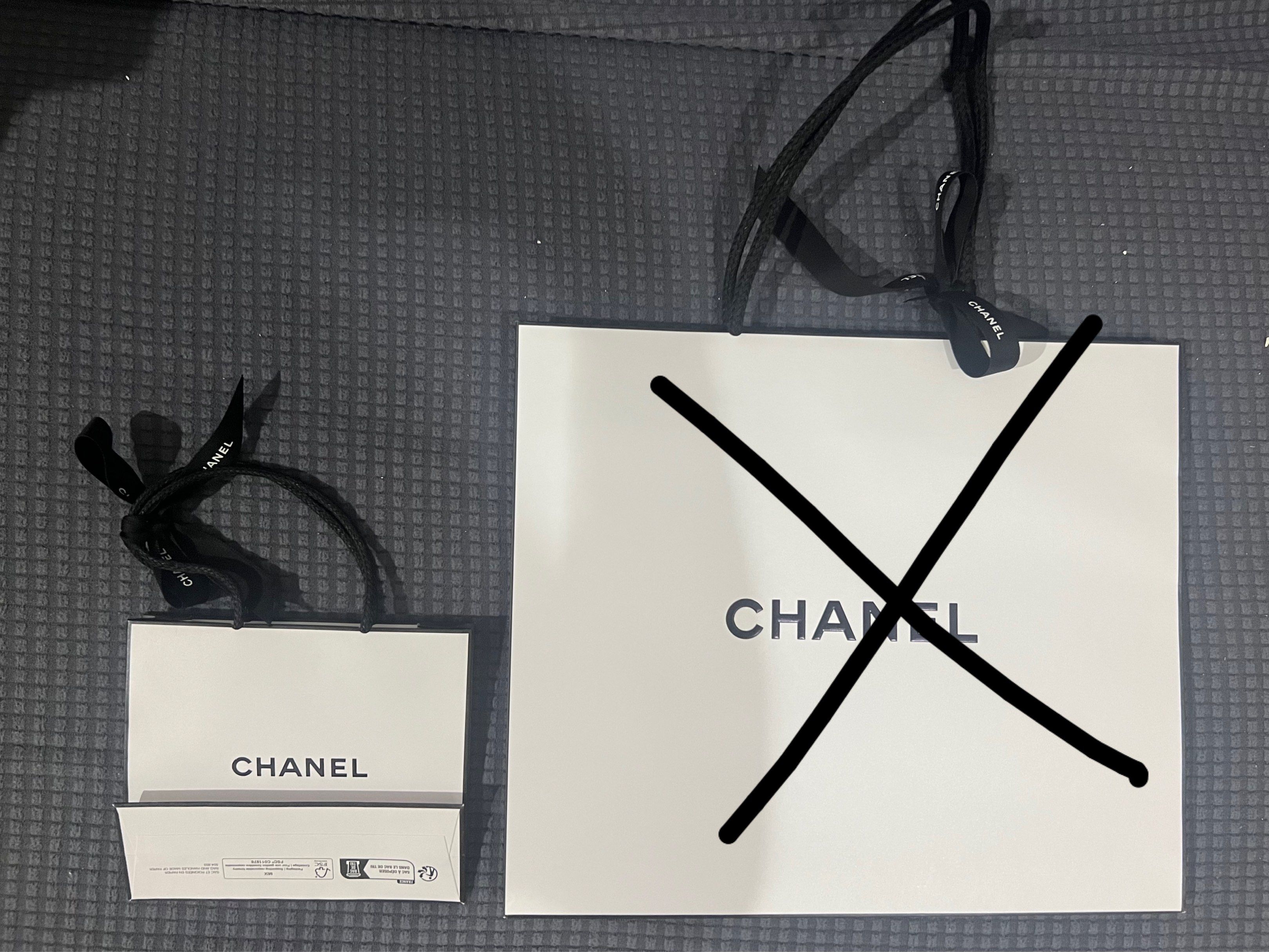 Authentic Chanel Beauty paperbag (Category: Luxury Bags & Wallets) located in Quezon City. Submitted by nxdeclutters (Listing ID 1421278949, Image 2). Description: - Authentic Chanel shopping bag - Features the iconic Chanel logo - Includes original ribbon and handles - Small size - Color: White with black accents - Ideal for gifting or collecting Last price posted From a personal store purchase at Glorietta Small size .