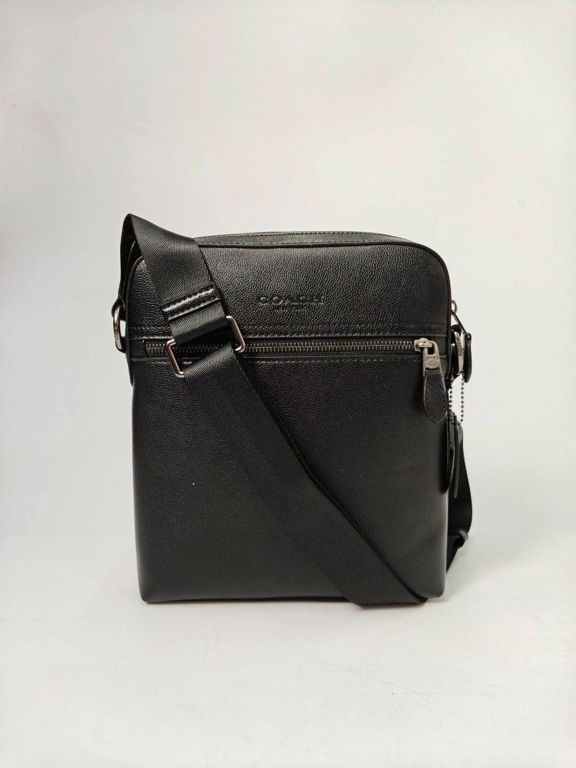 Authentic Coach for Men Black Messenger Bag (Category: Camera Bags & Carriers) located in Quezon City. Submitted by hollowwillow (Listing ID 1421205222, Image 1). Description: - Authentic Coach Houston Flight Bag in black refined pebble leather - Secure zip closure - Adjustable shoulder strap for a comfortable fit - Convenient front zip pocket - Spacious interior for daily essentials - Simple, sleek design ⚠️ STRICTLY PAYMENT FIRST AND WE DO THE 