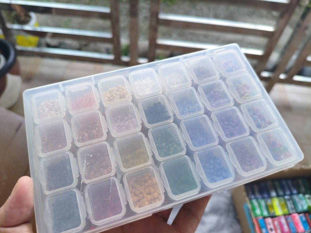 Beads in Organizer Box (Category: Craft Supplies & Tools) located in Arayat. Submitted by jpfinds19 (Listing ID 1421196384, Image 1). Description: - Assorted colorful beads - Clear organizer box with multiple compartments - Various bead colors and sizes - Perfect for crafting and jewelry making - Transparent box for easy bead selection.