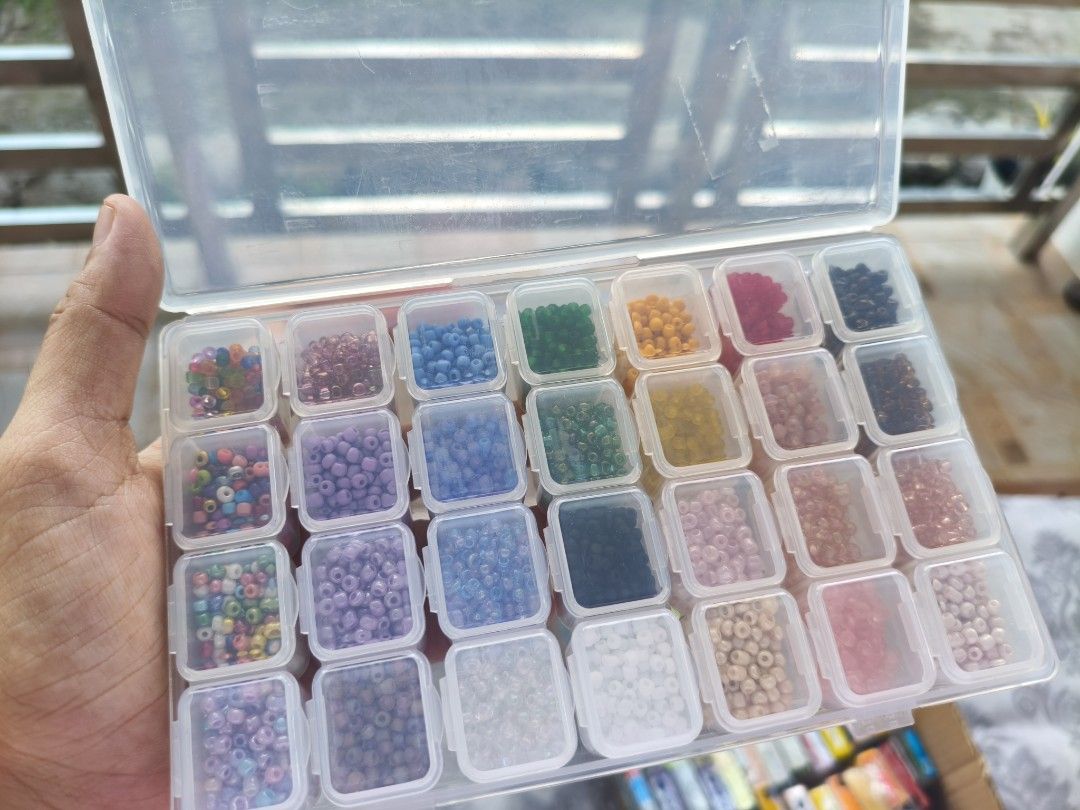 Beads in Organizer Box (Category: Craft Supplies & Tools) located in Arayat. Submitted by jpfinds19 (Listing ID 1421196384, Image 2). Description: - Assorted colorful beads - Clear organizer box with multiple compartments - Various bead colors and sizes - Perfect for crafting and jewelry making - Transparent box for easy bead selection.