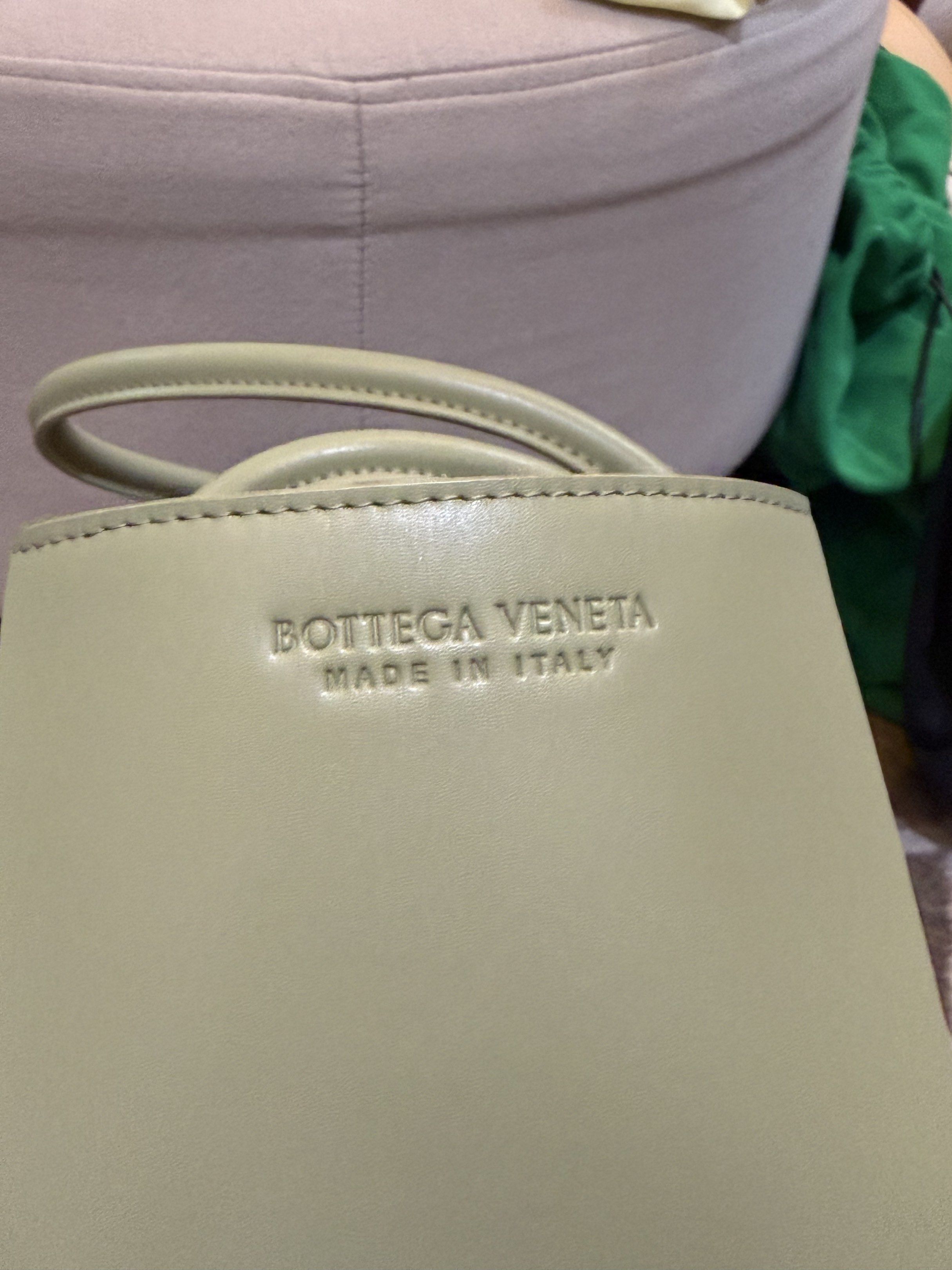 Bottega Veneta small Arco tote (with flaws) (Category: Tote Bags) located in Cebu City. Submitted by refabph (Listing ID 1421162996, Image 3). Description: - Bottega Veneta small Arco tote - Light green/ sage color - Made in Italy - Stylish and iconic tote - Japan preloved/ second hand.