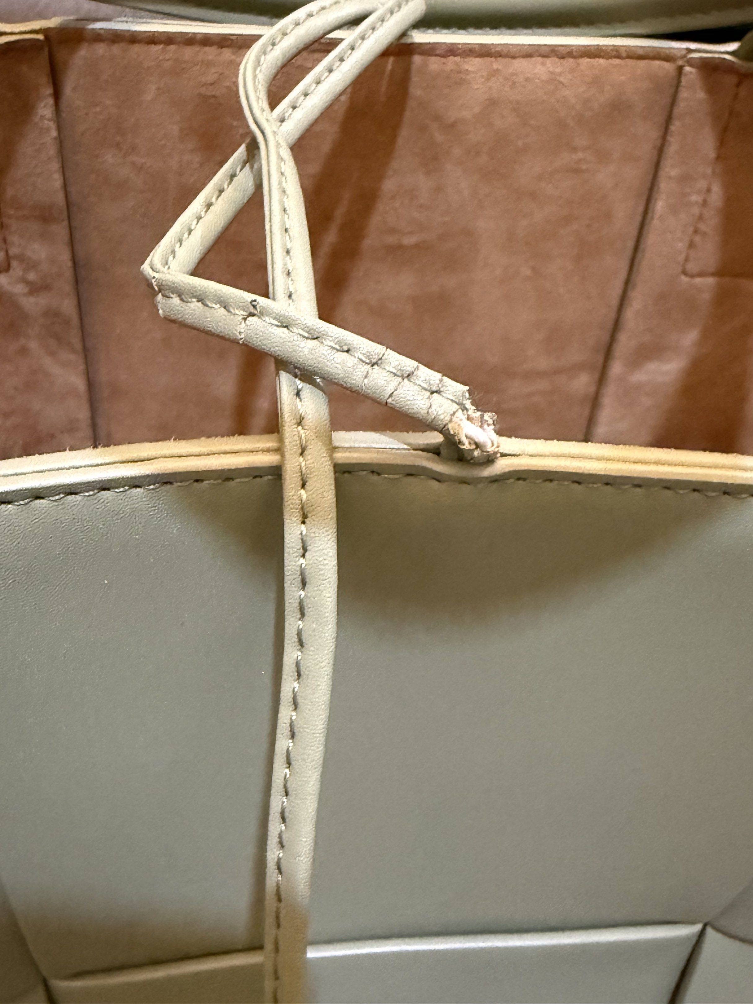 Bottega Veneta small Arco tote (with flaws) (Category: Tote Bags) located in Cebu City. Submitted by refabph (Listing ID 1421162996, Image 2). Description: - Bottega Veneta small Arco tote - Light green/ sage color - Made in Italy - Stylish and iconic tote - Japan preloved/ second hand.