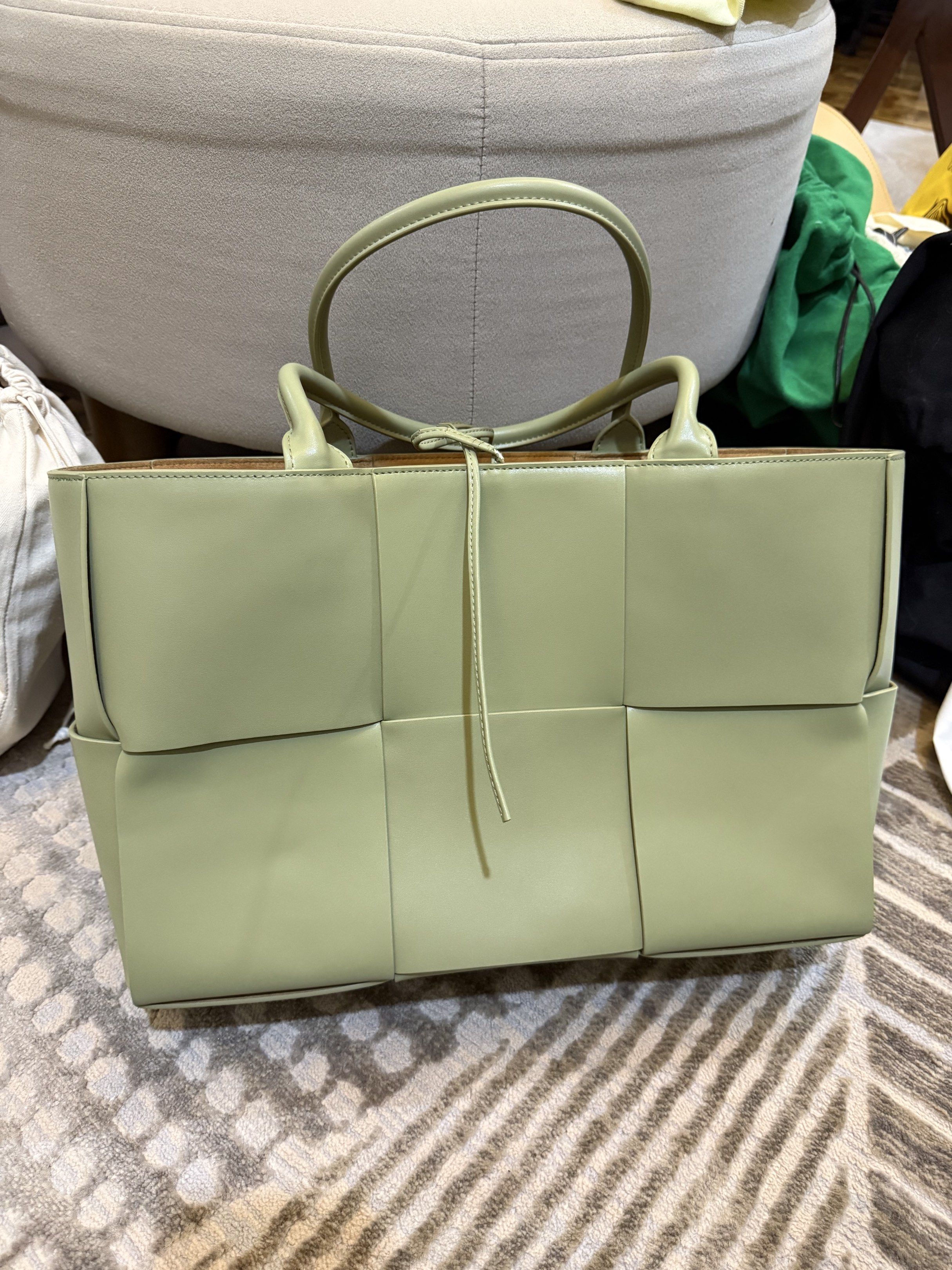 Bottega Veneta small Arco tote (with flaws) (Category: Tote Bags) located in Cebu City. Submitted by refabph (Listing ID 1421162996, Image 1). Description: - Bottega Veneta small Arco tote - Light green/ sage color - Made in Italy - Stylish and iconic tote - Japan preloved/ second hand.