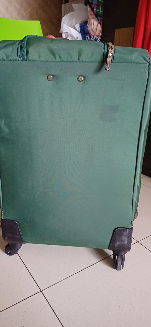 Brics Luggage (2 Sizes) (Category: Luggage) located in Manila. Submitted by kahlen36985 (Listing ID 1421161548, Image 2). Description: - 3k each or 2 for 5k - Scratches and marks as seen in photos. Wheels in need of replacement. No other issues. - Durable rolling luggage - 2 colors and sizes: green (medium) and maroon (small) - Multiple compartments for organized packing - Retractable handle for easy transport - Exterior pockets for quick access 
