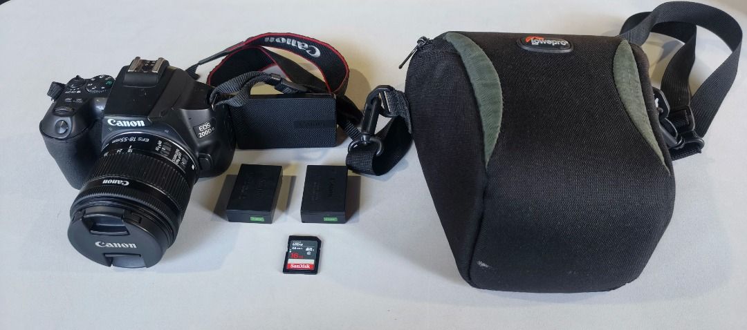 Canon EOS 200D II with Lens and Accessories (Category: Cameras) located in Caloocan City. Submitted by cleocarakm55983 (Listing ID 1421144178, Image 2). Description: - Canon EOS 200D II camera with 18-55mm lens - Includes two batteries - Comes with a memory card - Includes a Lowepro camera bag - Camera strap included - Perfect for photography enthusiasts!.