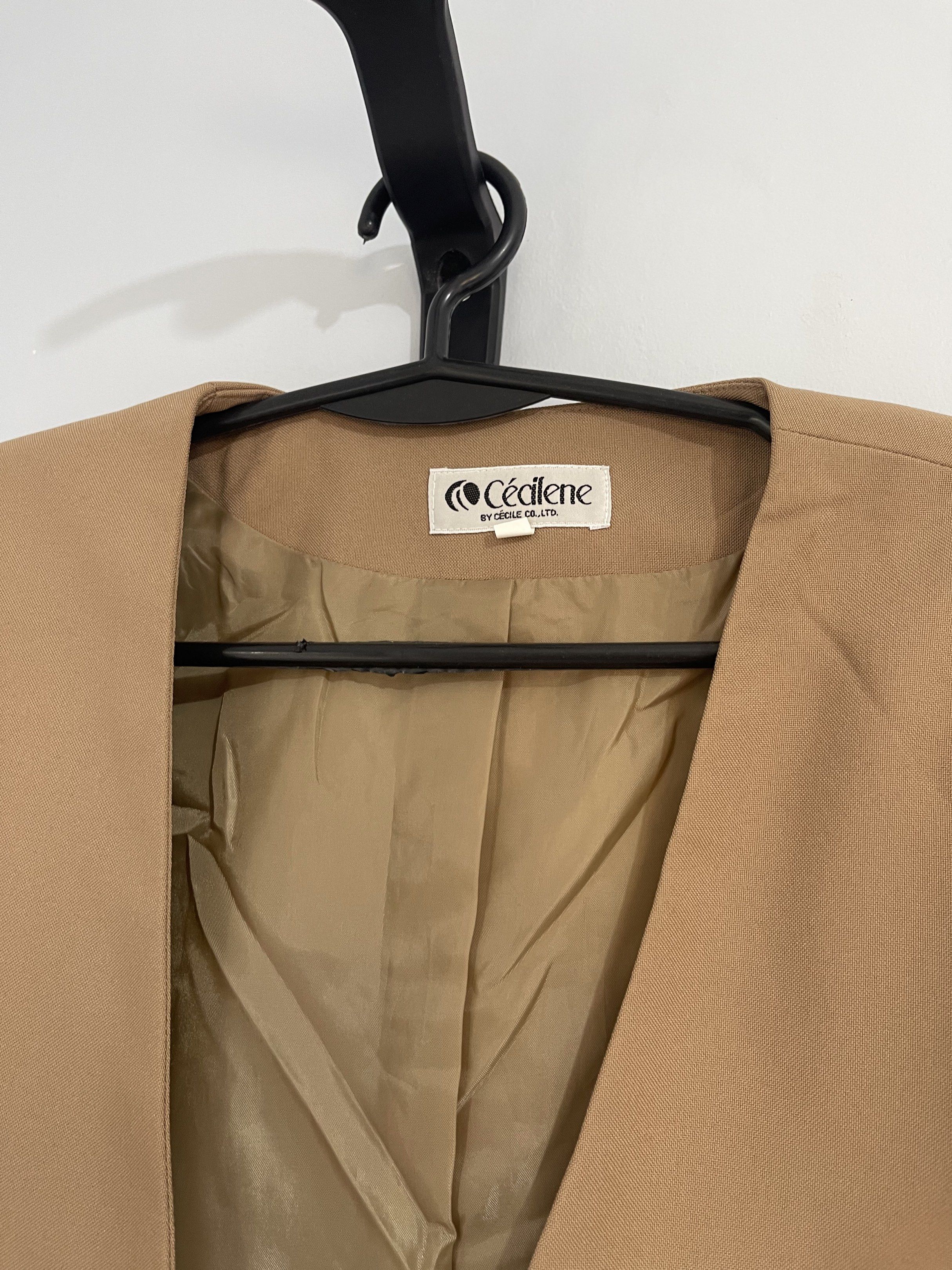 Cédilene Blazer - Tan (Category: Coats, Jackets and Outerwear) located in Taguig. Submitted by cs4lt (Listing ID 1421161351, Image 2). Description: - Cédilene tan blazer - Single-button closure - Notched lapel - Two front pockets - Tailored fit - Lighter tan lining - Classic style, versatile for formal or casual wear.