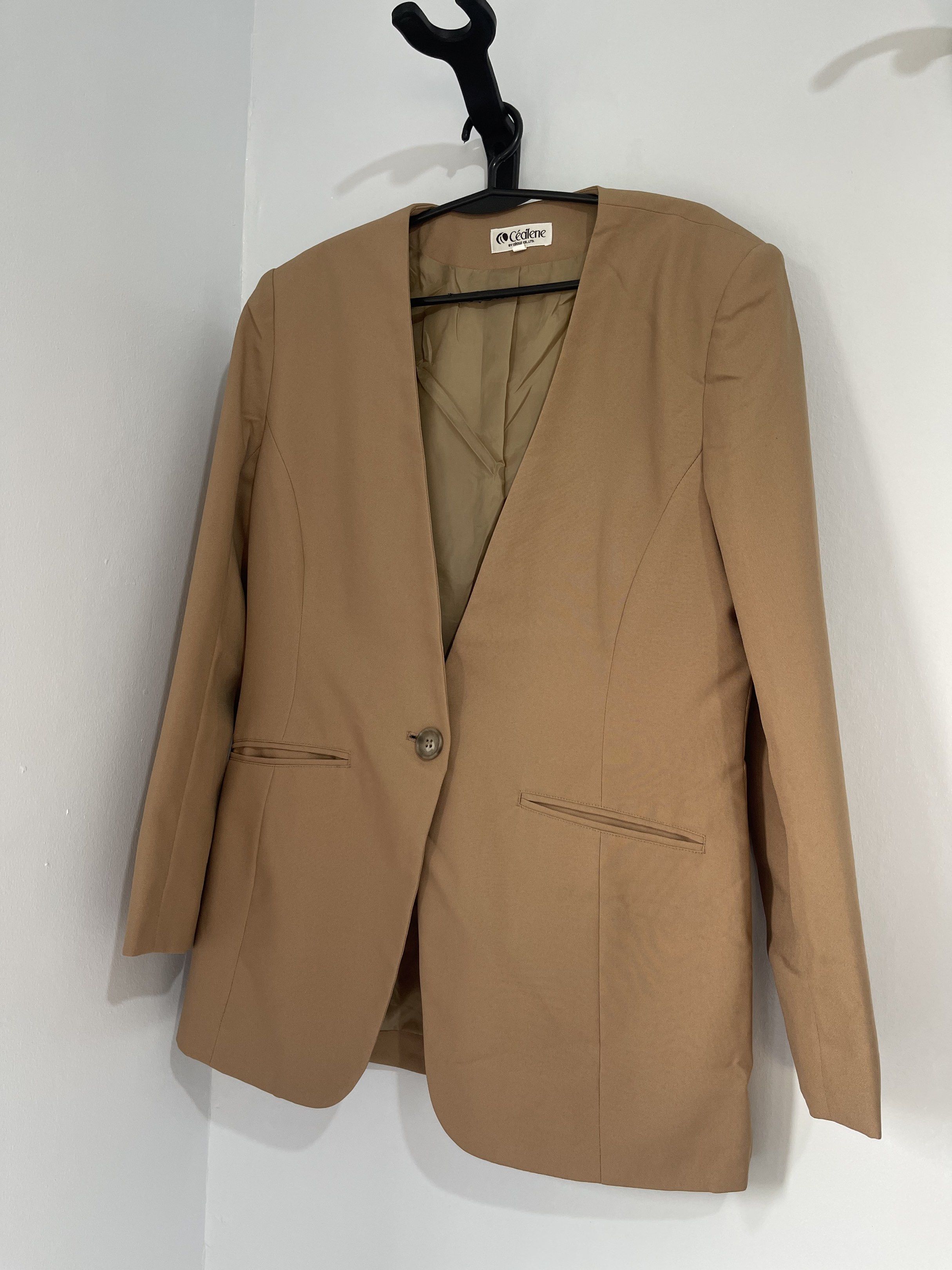 Cédilene Blazer - Tan (Category: Coats, Jackets and Outerwear) located in Taguig. Submitted by cs4lt (Listing ID 1421161351, Image 1). Description: - Cédilene tan blazer - Single-button closure - Notched lapel - Two front pockets - Tailored fit - Lighter tan lining - Classic style, versatile for formal or casual wear.