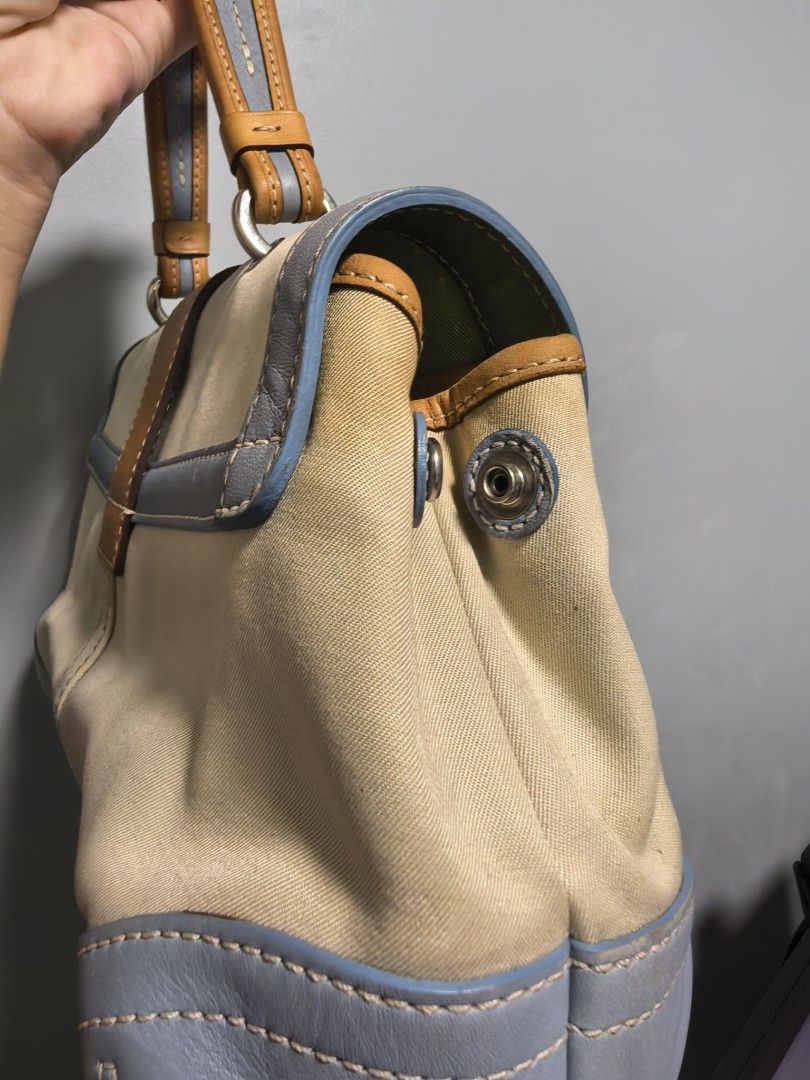 Coach Handbag with Cherry Charm (Category: Luxury Bags & Wallets) located in Manila. Submitted by imjustabag.addict (Listing ID 1421287613, Image 3). Description: Charm not included. Issue: No hangtag Inside zonrox bleached (honestly not a problem for me hehe) Outside stain as per pic (Ang alam ko there's a way to remove that kind of stain like tissue method etc., di ko lang naaasikaso kasi walang time) Minor signs of use. Hard to let go, that's 