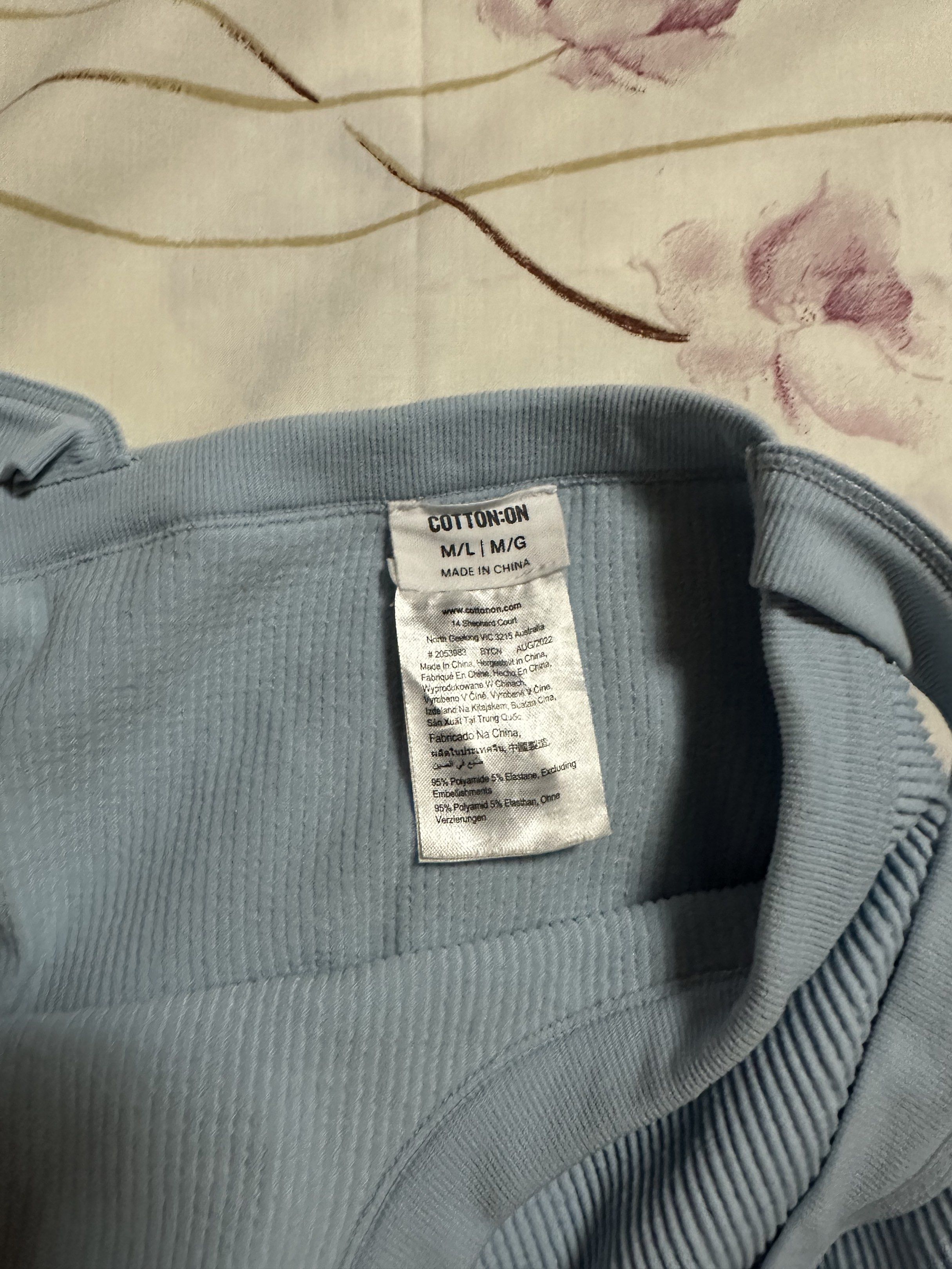 Cotton On Ribbed Crop Top (XS-M) (Category: Shirts) located in Manila. Submitted by chaneli2629 (Listing ID 1421220113, Image 2). Description: - Light blue ribbed crop top - Size: M on tag|-Fits XS-M - Features a square neckline.